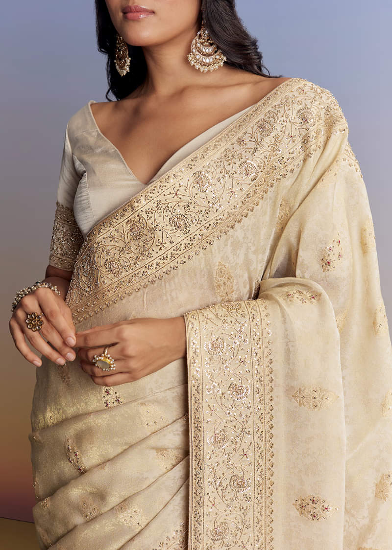 cream-jacquard-silk-saree-with-zari-brocade-and-zardosi-embellished-pallu-sg177295-3_1_264f7d2e-1e4b-41c3-8400-cc0bf11bb020.jpg