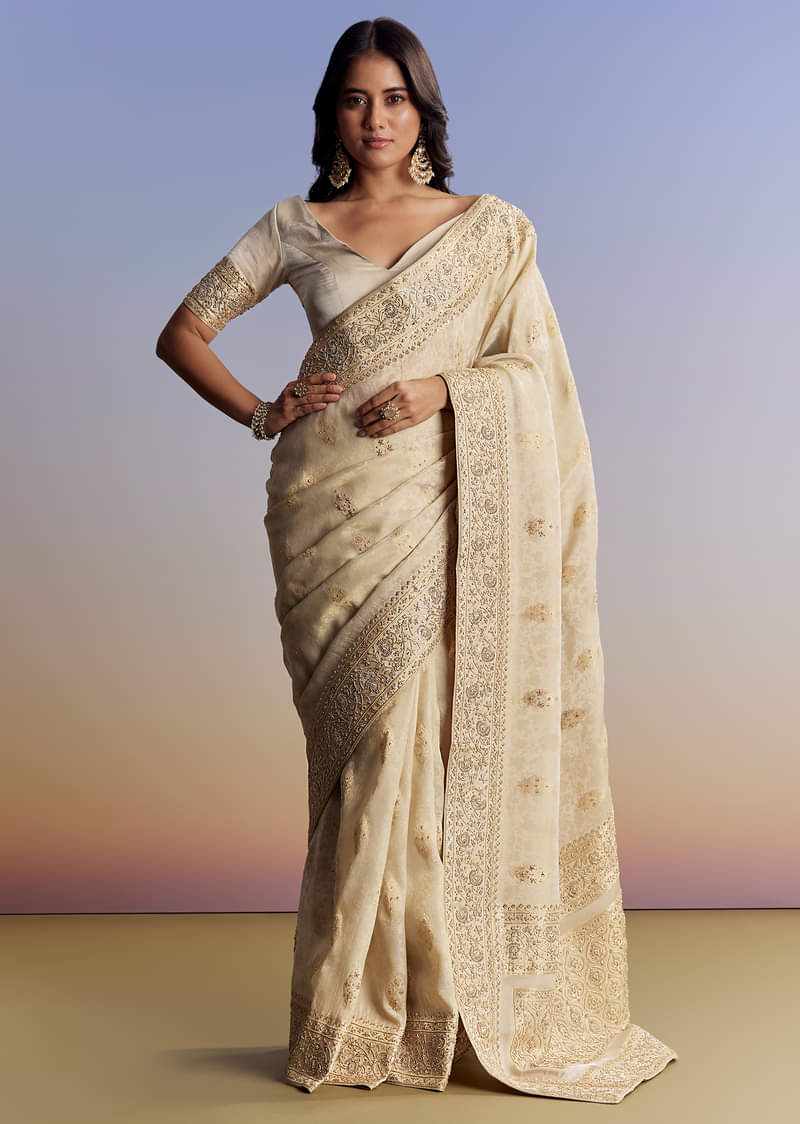 cream-jacquard-silk-saree-with-zari-brocade-and-zardosi-embellished-pallu-sg177295-5_1_7a07c2bb-abed-497e-a378-9d0889229533.jpg