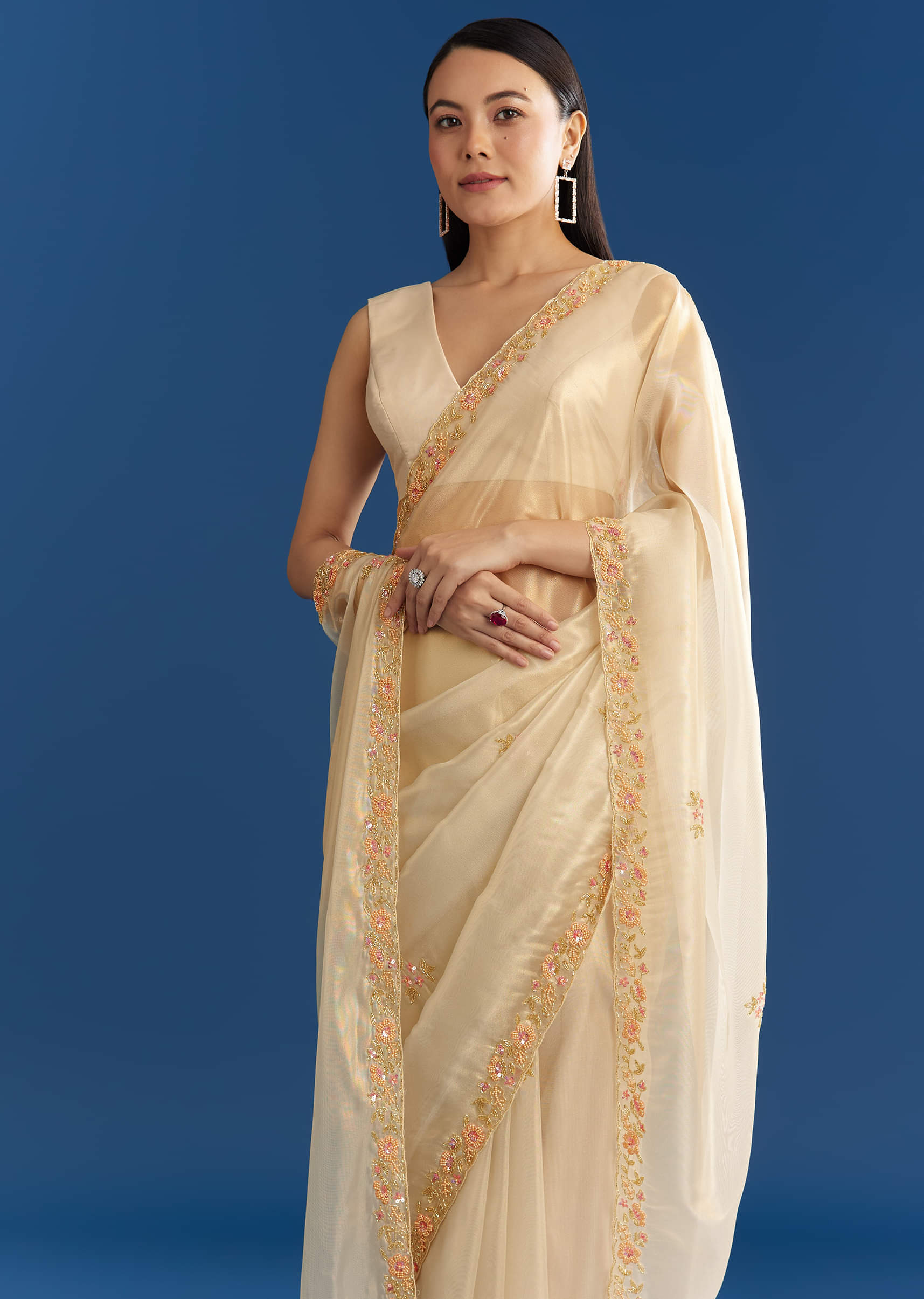 cream-organza-tissue-saree-with-subtle-beaded-border-sg284725-5_877a0491-8df5-4e84-8fd9-0e6df328cfc5.jpg
