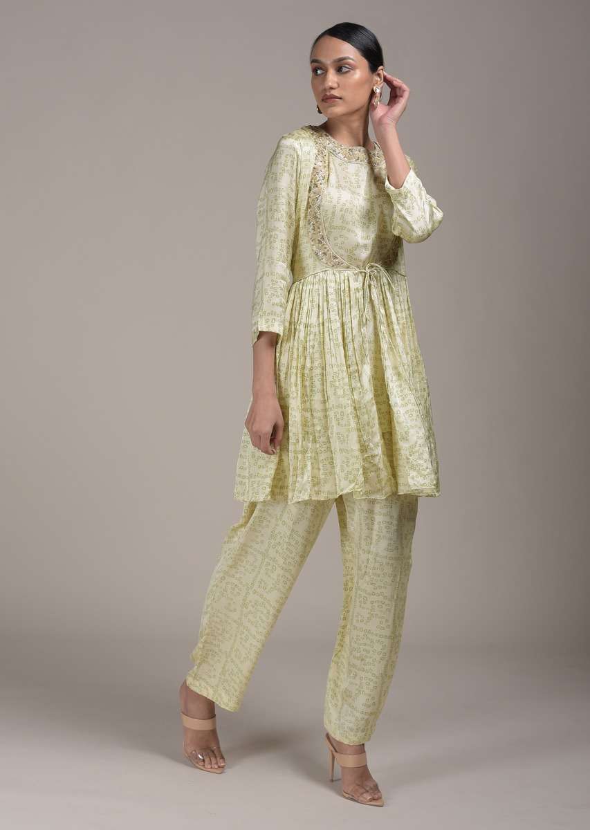cream-peplum-suit-in-satin-blend-with-bandhani-print-all-over-online-kalki-fashion-d0015050y-sg47255_2_0e2fd96d-90bb-45e5-a7ec-b94b075bd6d9.jpg