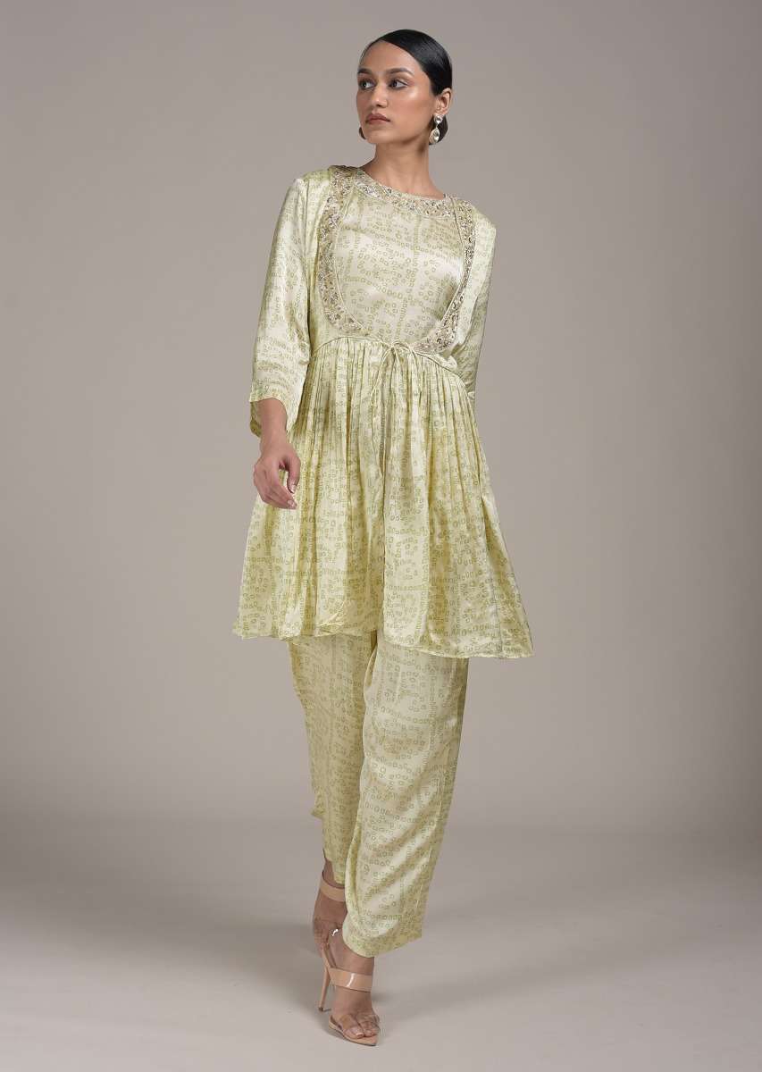 cream-peplum-suit-in-satin-blend-with-bandhani-print-all-over-online-kalki-fashion-d0015050y-sg47255_3_849f846e-f4bf-4add-94a1-bdf69d687796.jpg