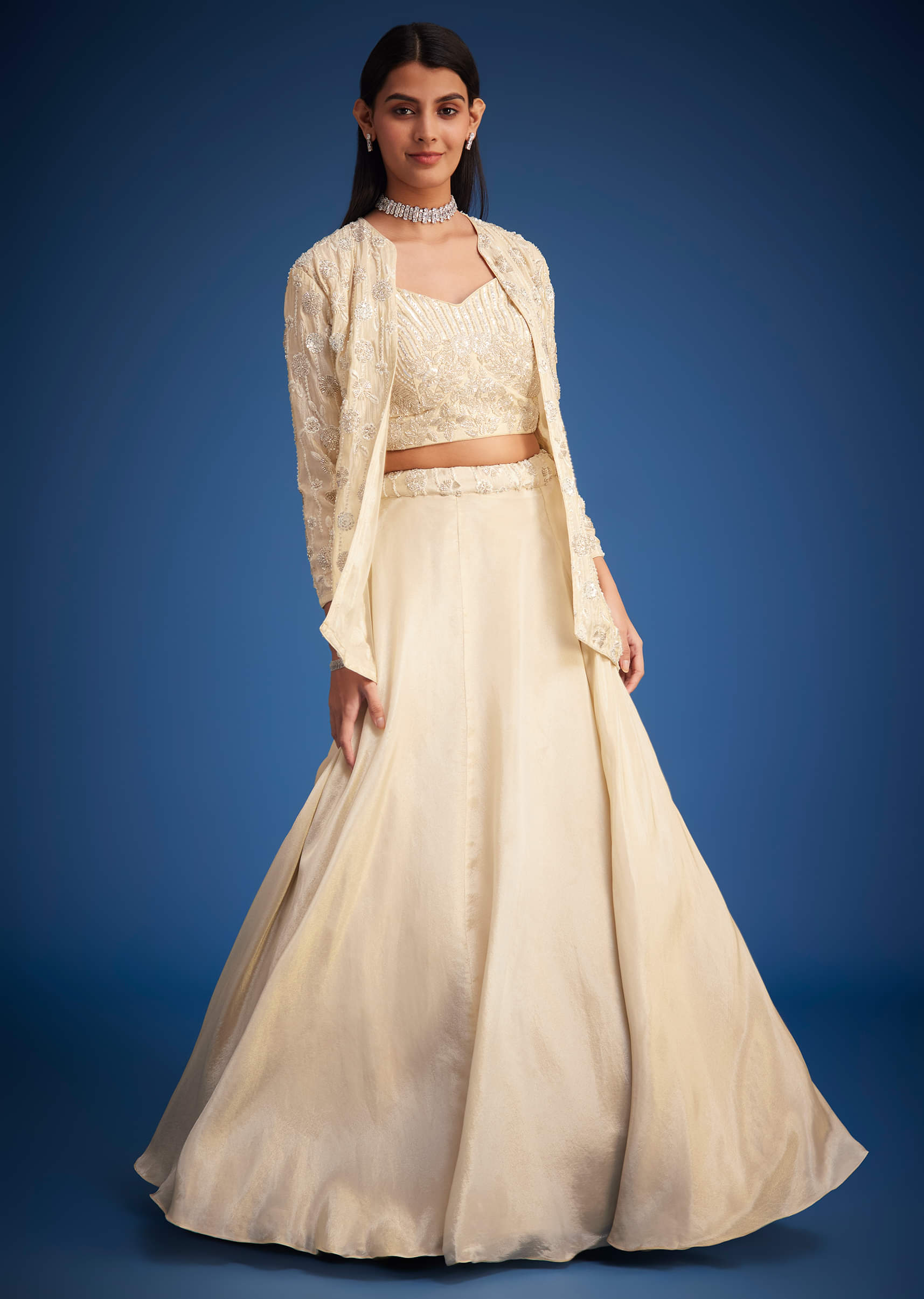 cream-raw-silk-embroidered-jacket-lehenga-set-sg298694-1_b2e23229-4235-475b-9dc9-c43c4ffd0fff.jpg