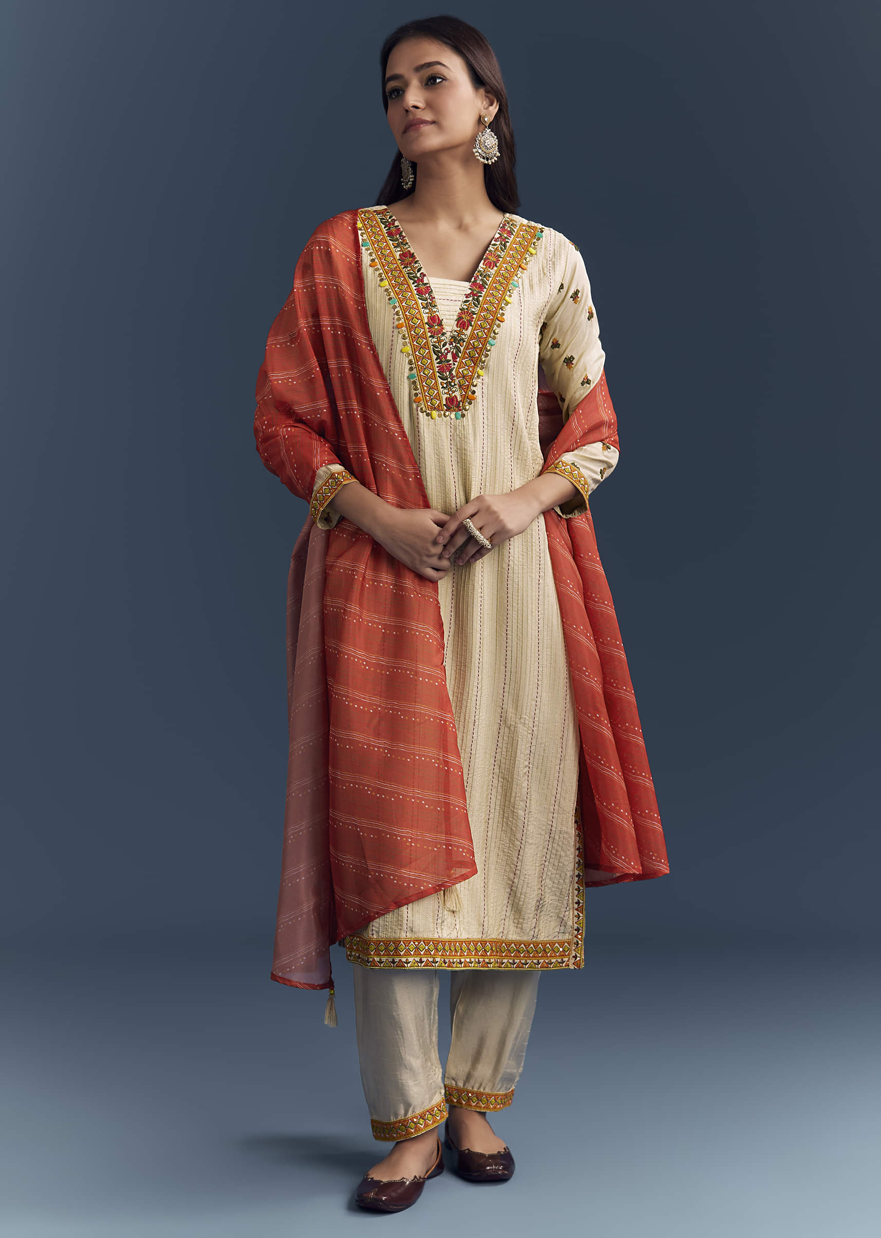 cream-silk-kurta-set-with-delicate-resham-work-1.jpg