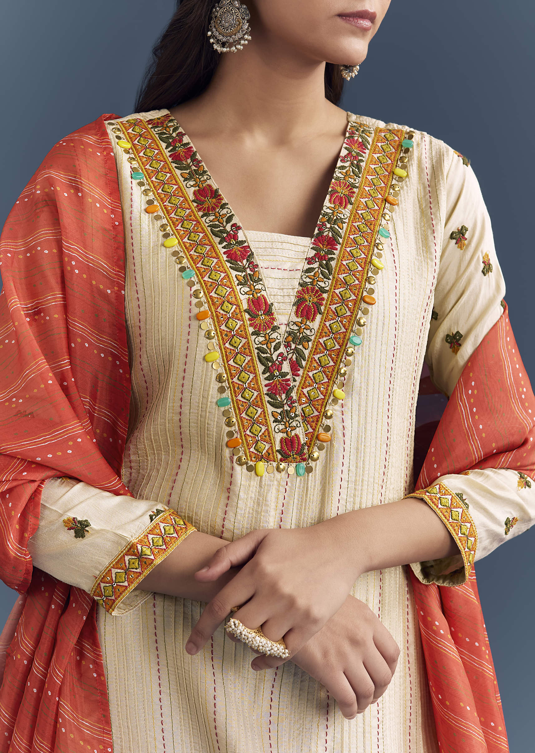 cream-silk-kurta-set-with-delicate-resham-work-2.jpg
