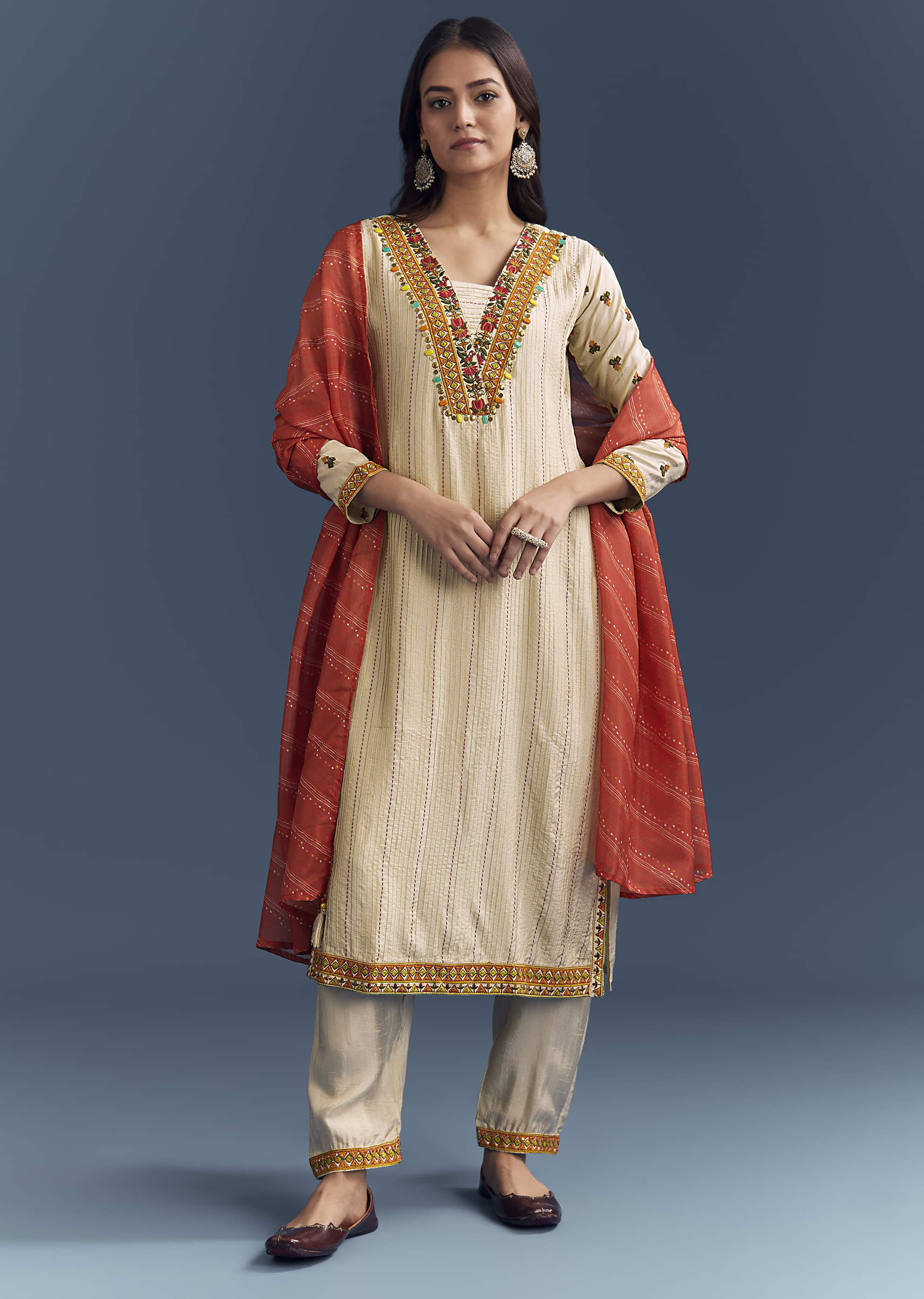 cream-silk-kurta-set-with-delicate-resham-work-3.jpg