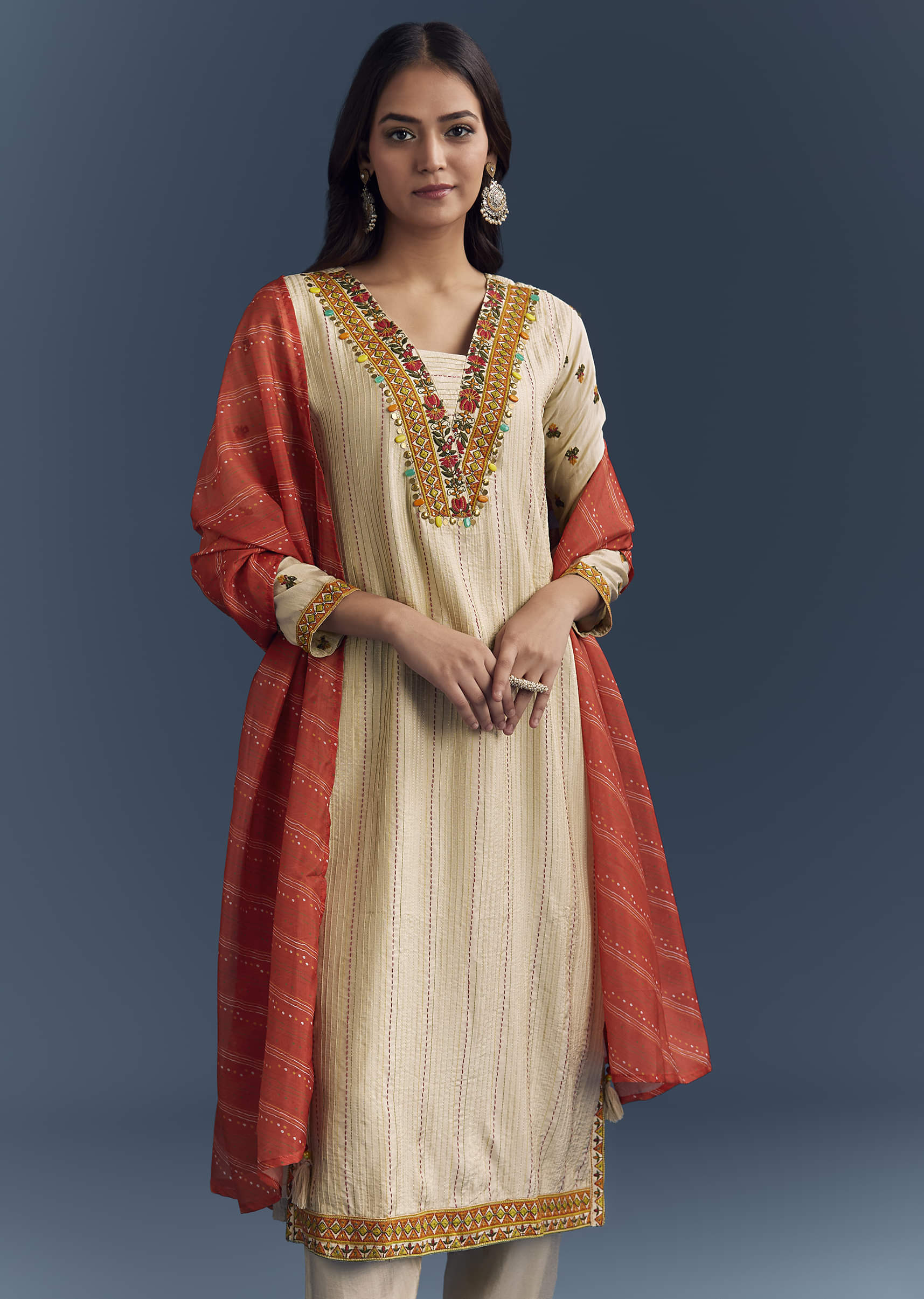 cream-silk-kurta-set-with-delicate-resham-work-4.jpg