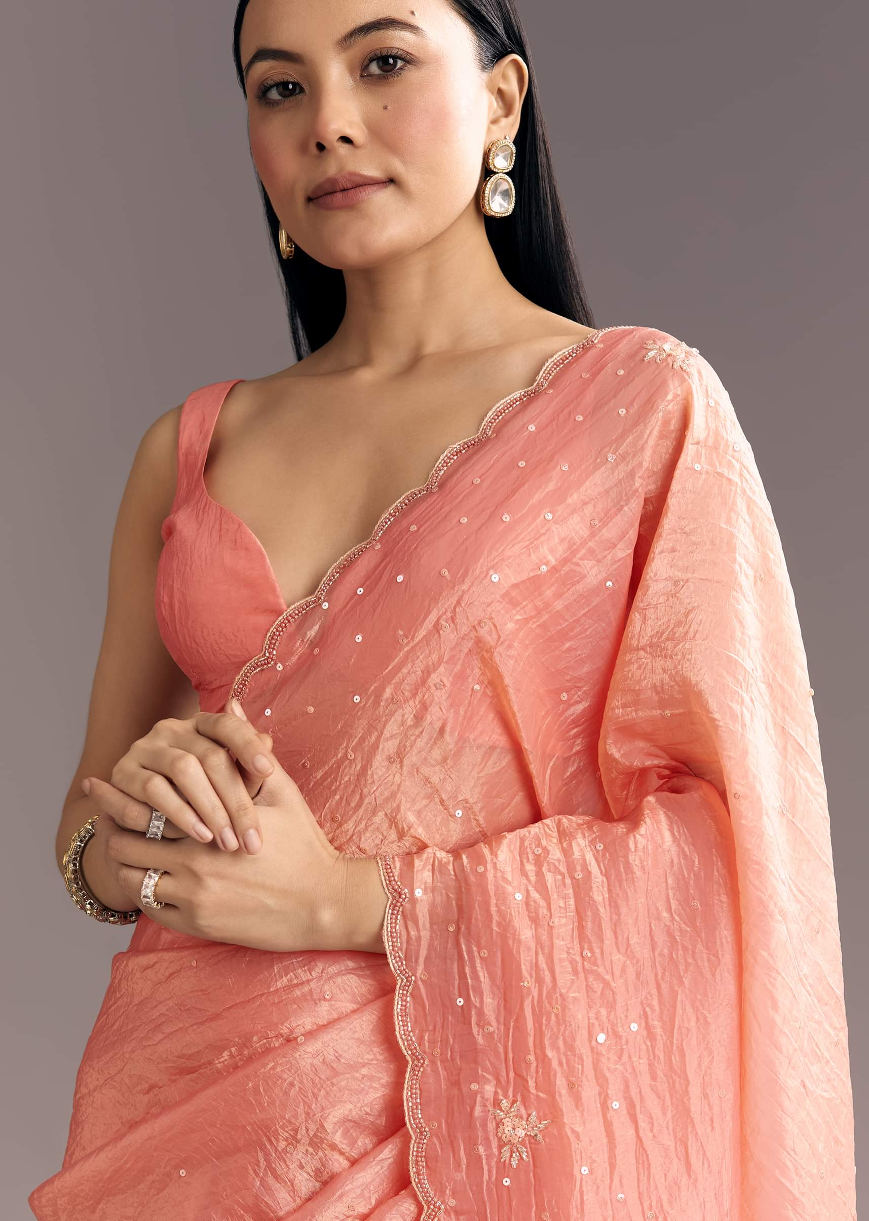 dark-peach-crushed-tissue-embroidered-saree-with-scallop-border-sg296162-1_1_a008fe2e-a6df-4d0b-a253-87320d6ed31d.jpg