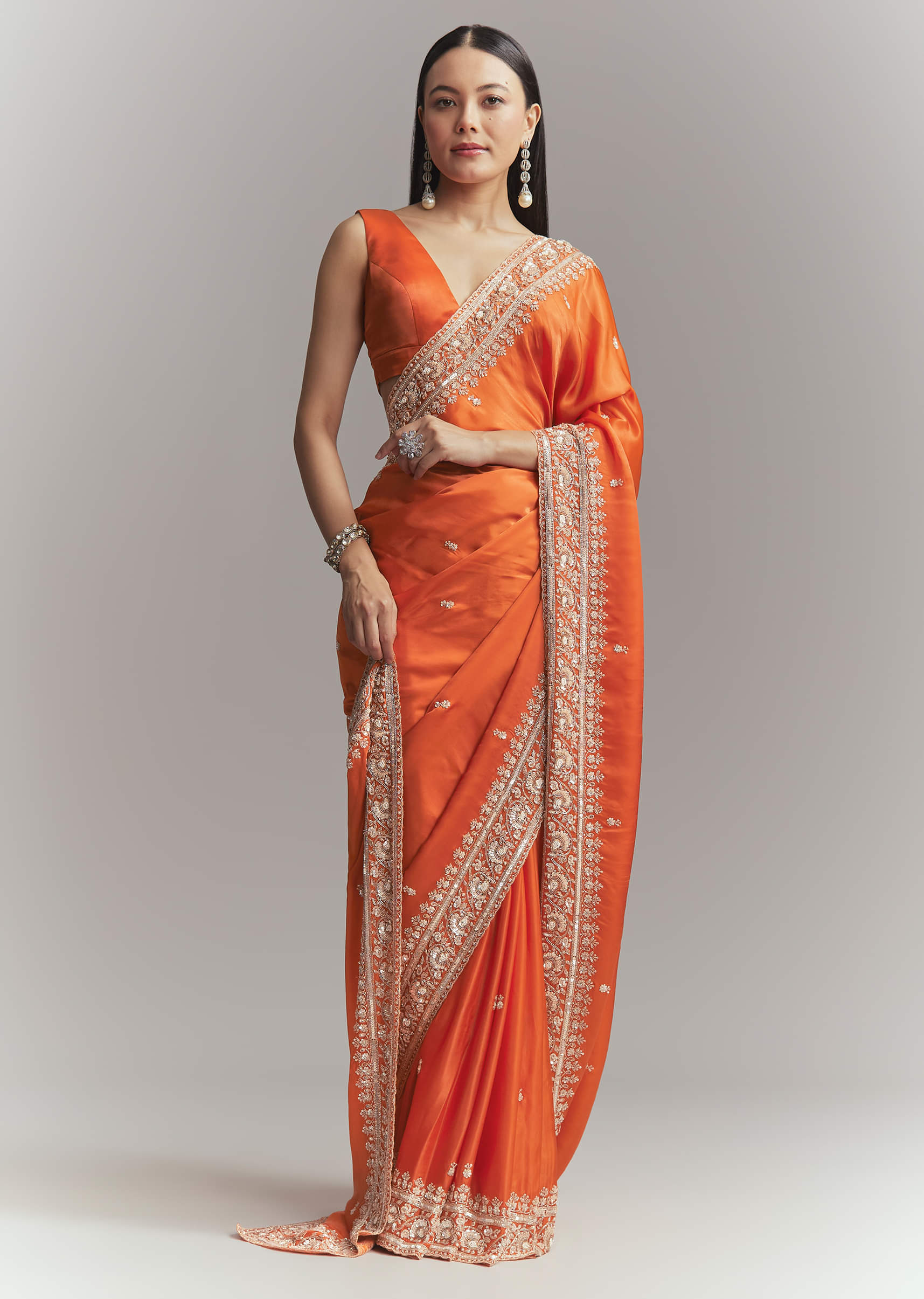 dusky-orange-satin-embroidered-saree-with-heavy-hand-embroidery-sg338625-1.jpg