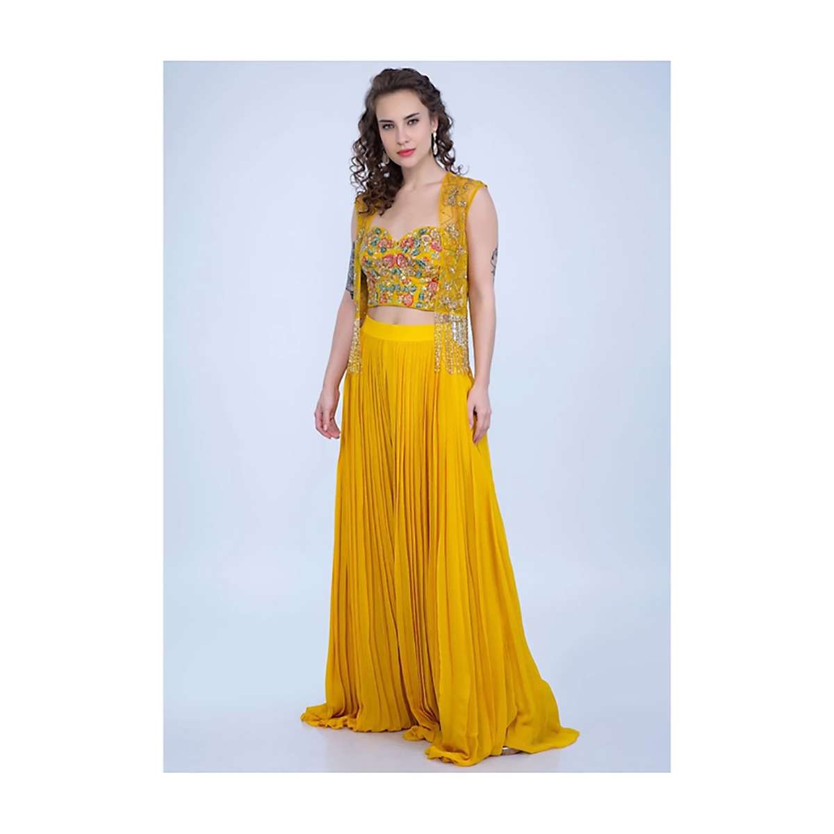 dustan_sun_mustard_palazzo_in_georgette_with_strapless_corset_and_embroidered_net_jacket_with_tassels_online_-_kalki_fashion_e7c26f4b-5d99-4798-b36a-0fc73da10a42.jpg