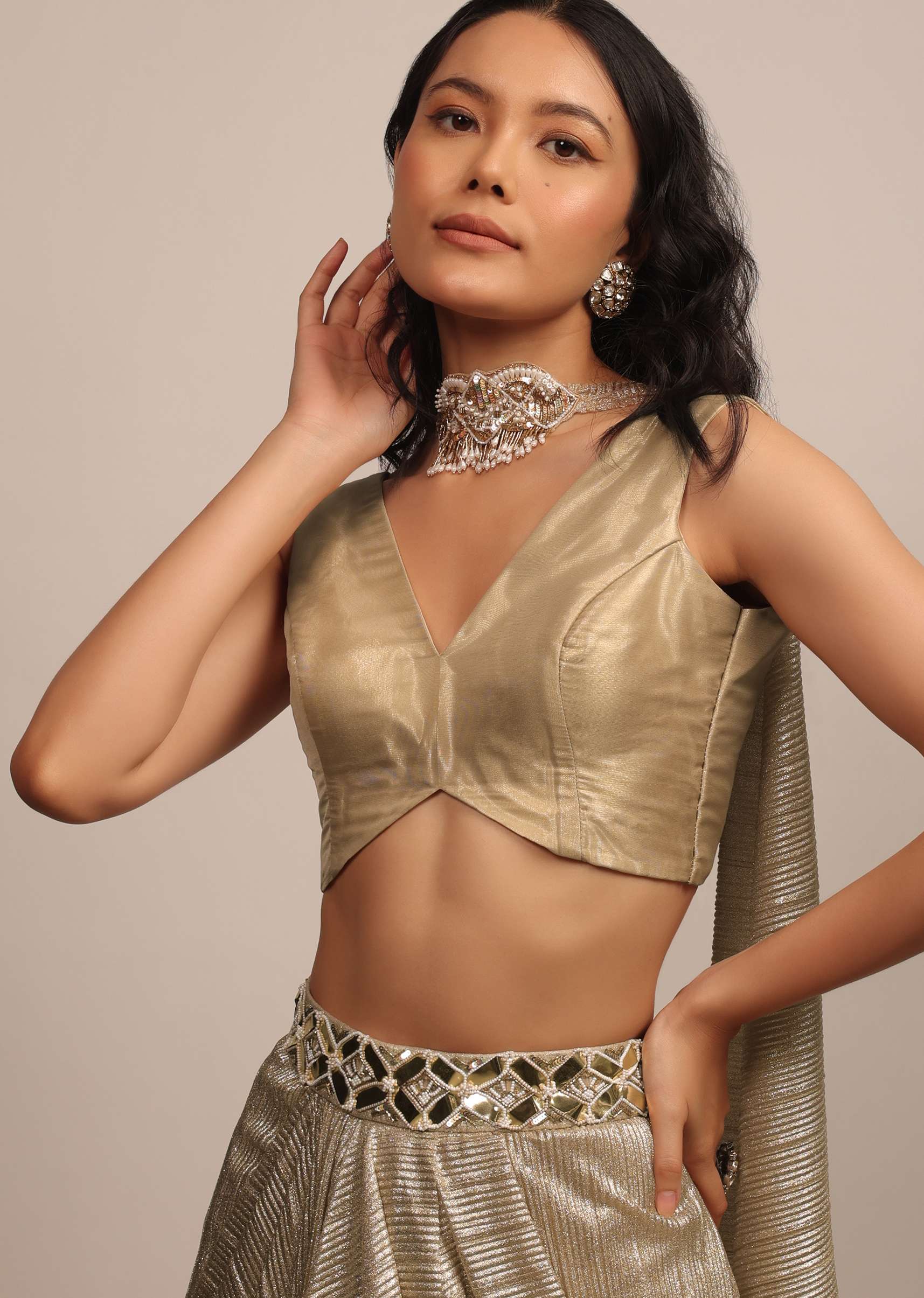 dusty_gold_sleeveless_blouse_in_jute_organza_fabric_with_a_v-neckline-sg149872_2_eb2dbfec-b1dc-4224-b0d6-6d538e6bfce8.jpg