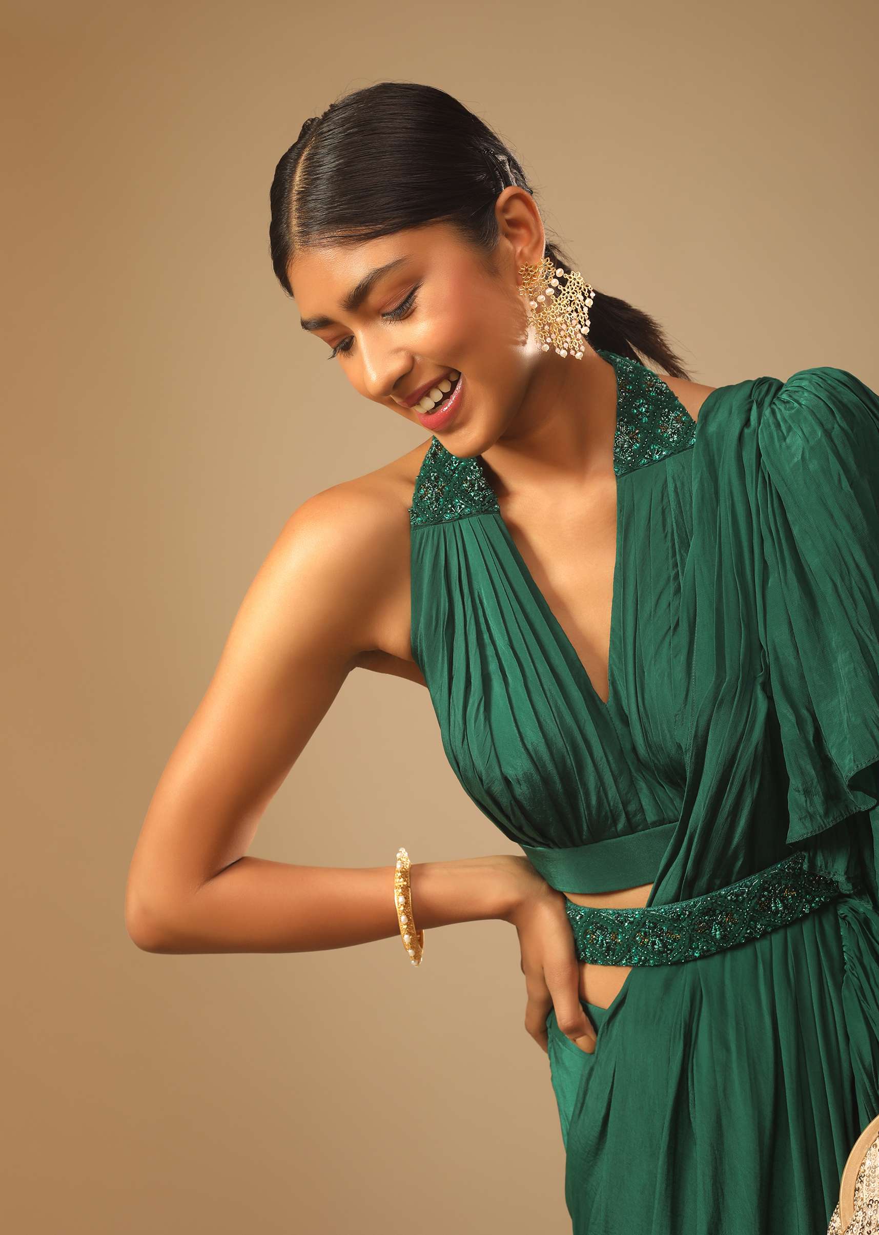 emerald-green-ready-pleated-ruffle-saree-with-a-halter-neck-blouse-and-3d-embroidered-belt-online-kalki-fashion-m001ra530y-sg73721_4_2c880bf8-5ef7-4c8f-af02-9879cce896d5.jpg