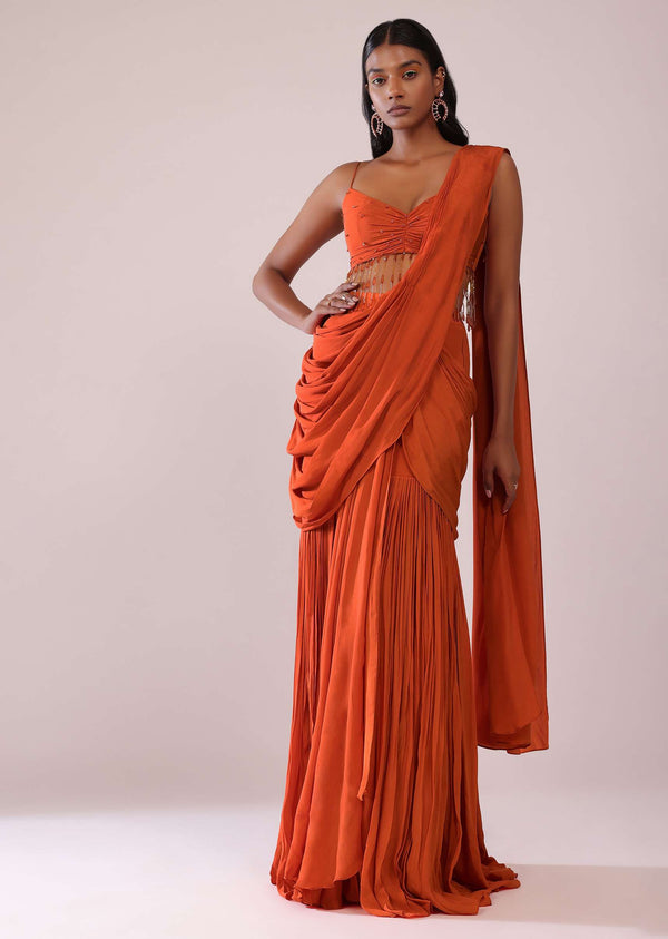 Orange Crepe Drape Saree And Blouse With Crystal Tassels All Over