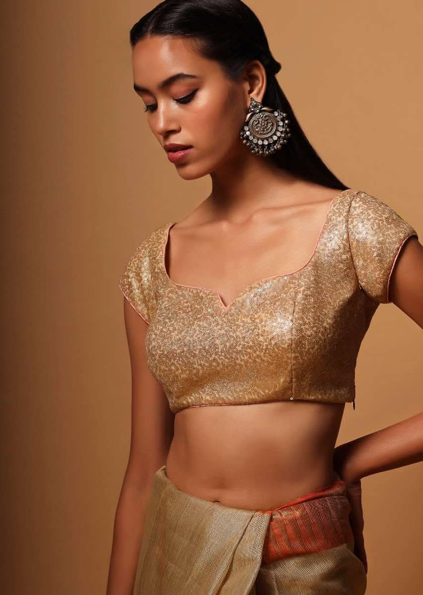 gold-blouse-in-net-with-contrasting-peach-piping-around-the-edges-and-sequins-work-all-over-online-kalki-fashion-m001bldy41y-sg57017_4_dc4c6d3e-3d24-4e87-af48-aa1c2722a034.jpg