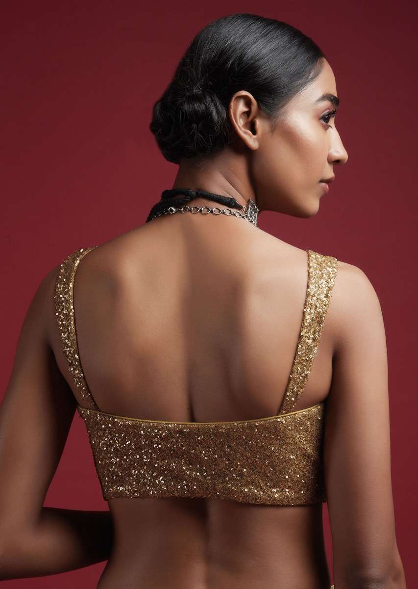 gold-blouse-in-sequins-fabric-with-tapering-straps-on-the-shoulders-and-corset-neckline-online_-kalki-fashion-m001bldy44y-sg57020_5__1_346aa45b-1184-4d5a-9a95-4ed5923b141f.jpg