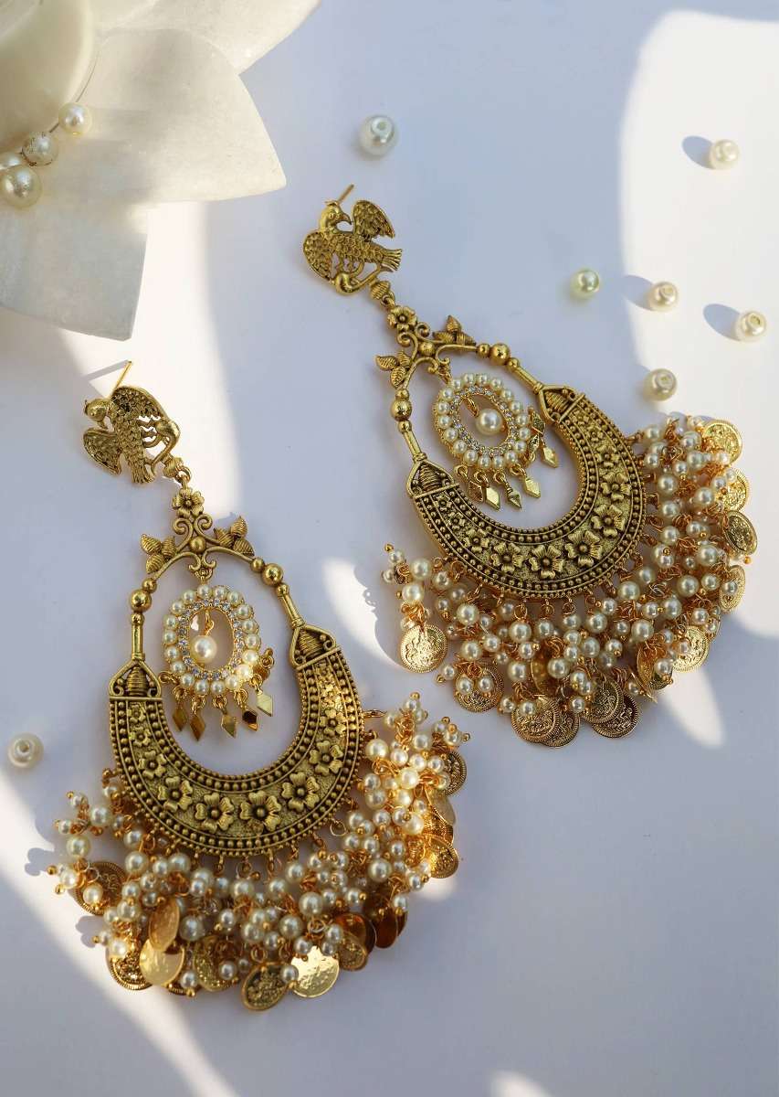 gold-chandbali-earrings-adorned-in-rich-shell-pearls-and-intricate-temple-detailing-by-paisley-pop-jk001ppsae70005y-sg65097_1__1_1f021dd5-fbef-43d1-98e7-eee343250aa8.jpg