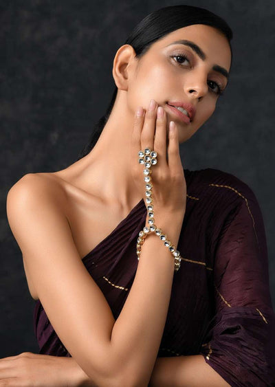 gold-plated-hand-harness-with-beautifully-handcrafted-floral-design-adorned-in-kundan-work-by-paisley-pop-jk001ppsab40010y-sg65312_2_33d22d1e-7ca5-46e0-baf3-85539bb652a3.jpg