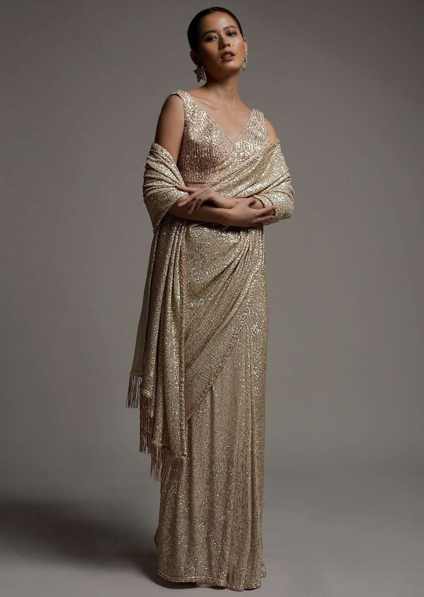 gold_beige_saree_in_sequins_fabric_with_fringes_on_the_pallu_and_unstitched_blouse_online_-_kalki_fashion_4_c8fd9eb7-4fce-4c75-80a5-9547bef39d15.jpg
