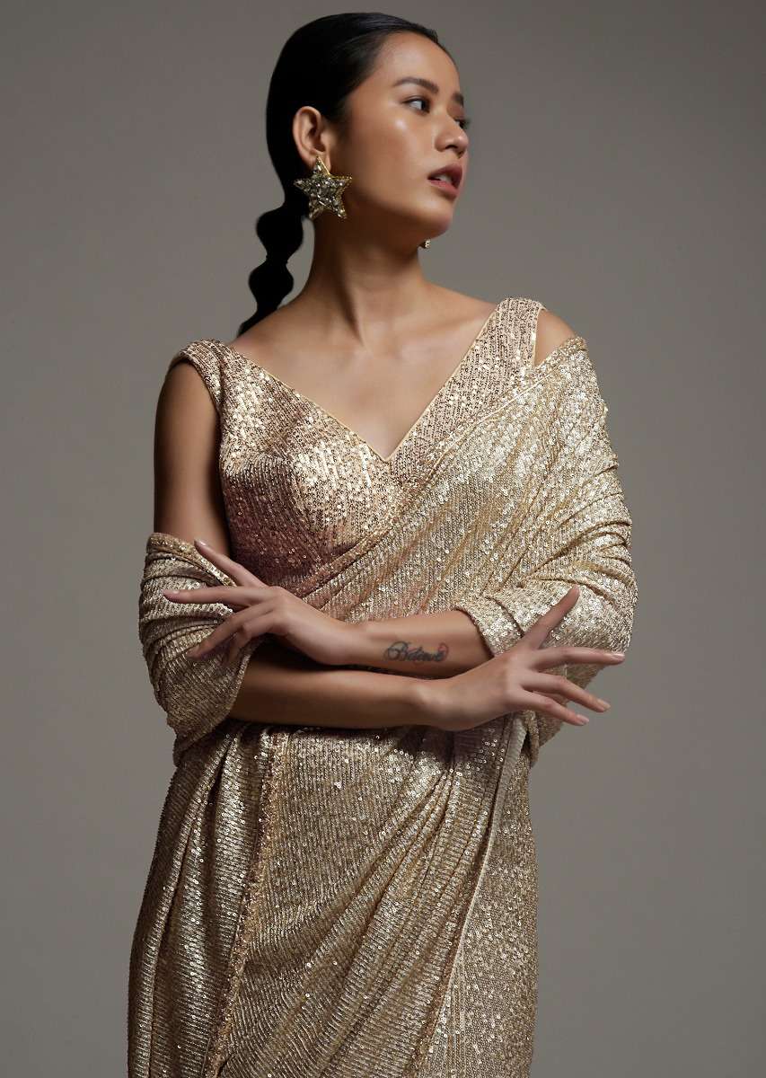 gold_beige_saree_in_sequins_fabric_with_fringes_on_the_pallu_and_unstitched_blouse_online_-_kalki_fashion_5_666f0810-b6fa-41ef-ab93-4350613b16bc.jpg