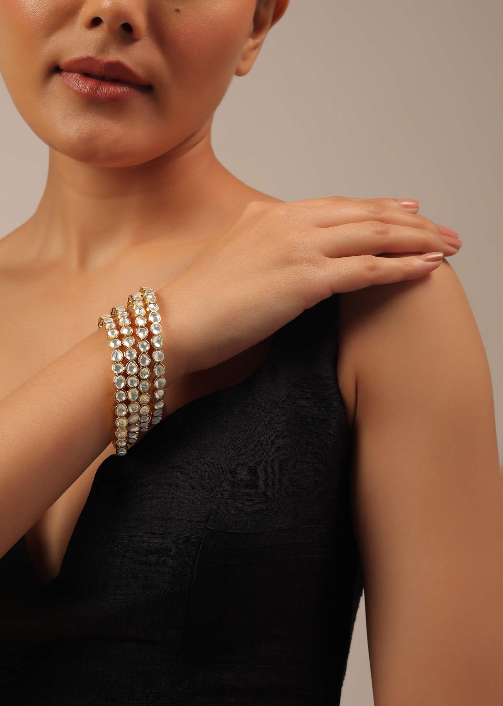 gold_finish_jadau_kundan_polki-sg145739_2_4cf45279-3eea-4016-adac-14640959f0c7.jpg