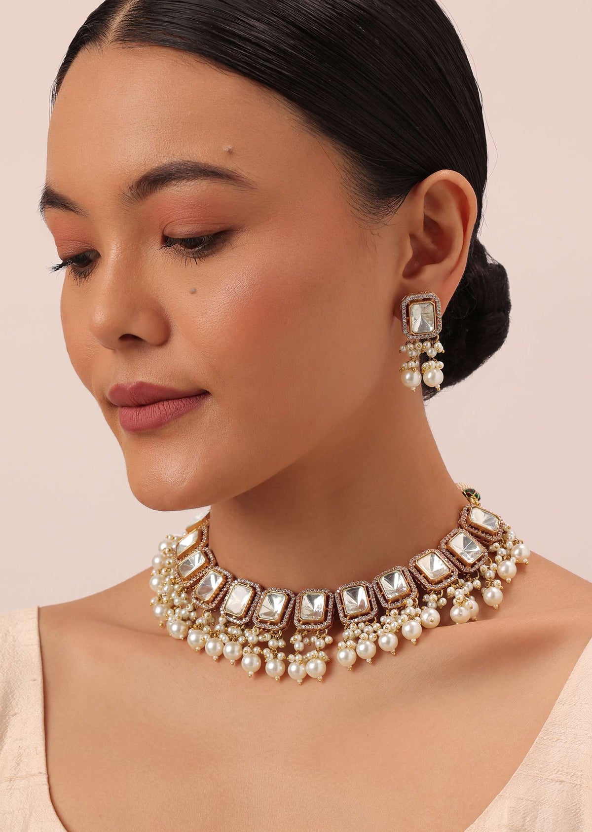 gold_finish_kundan_necklace_set_with_pearl_drops_and_geometr-sg166387_8_8b8f5890-eb43-49db-b618-d6b0b3c91c7f.jpg