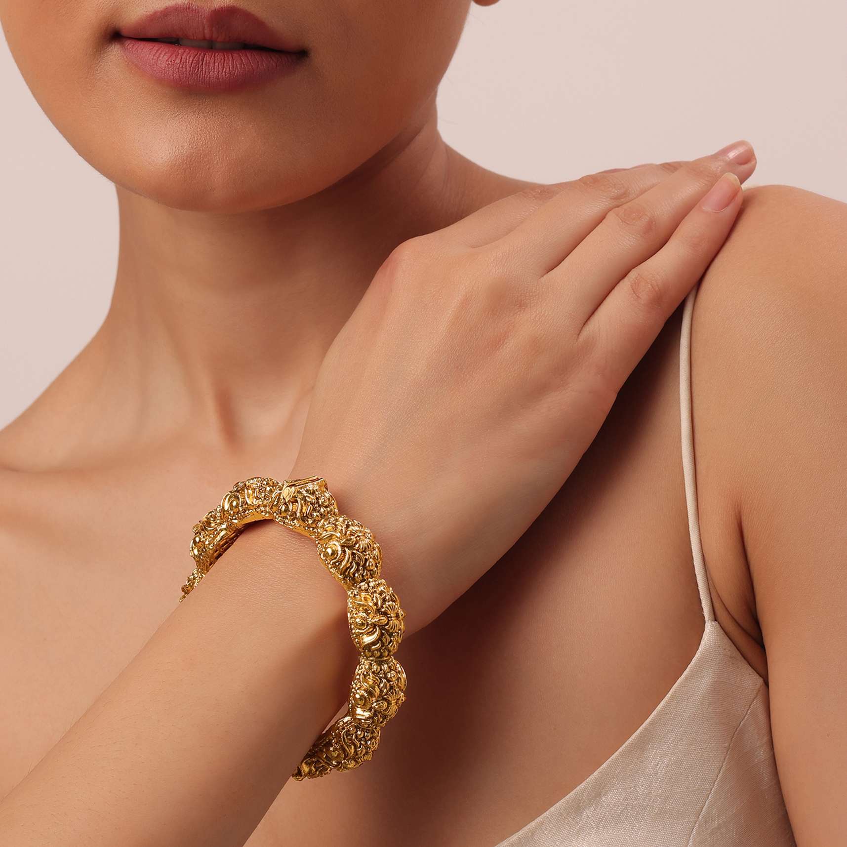 gold_finish_temple_style_bangle_with_carvings-sg166091_4_b12ff894-569b-4766-9bf5-e148e4097376.jpg