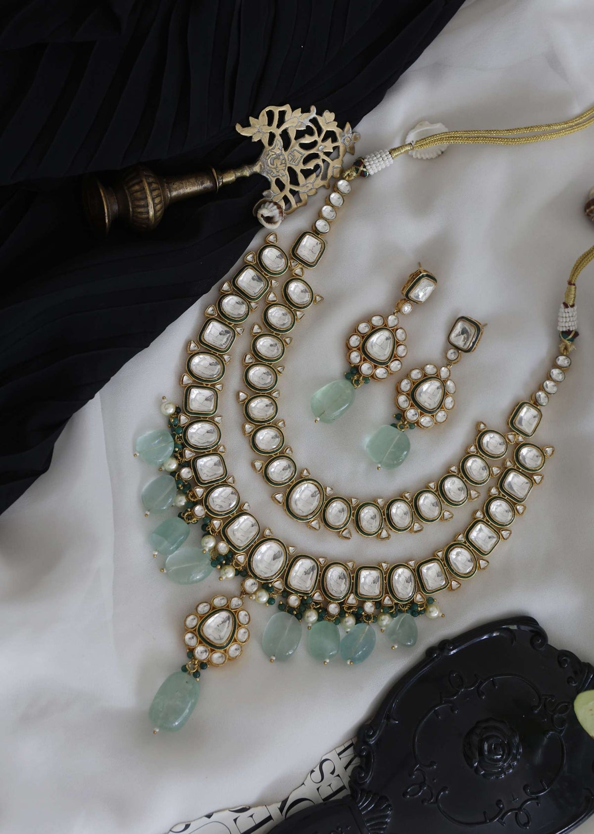 gold_plated_polki_necklace-sg172287_6_9f16eb7f-cbd0-4167-9b5c-c2b81f0756c4.jpg