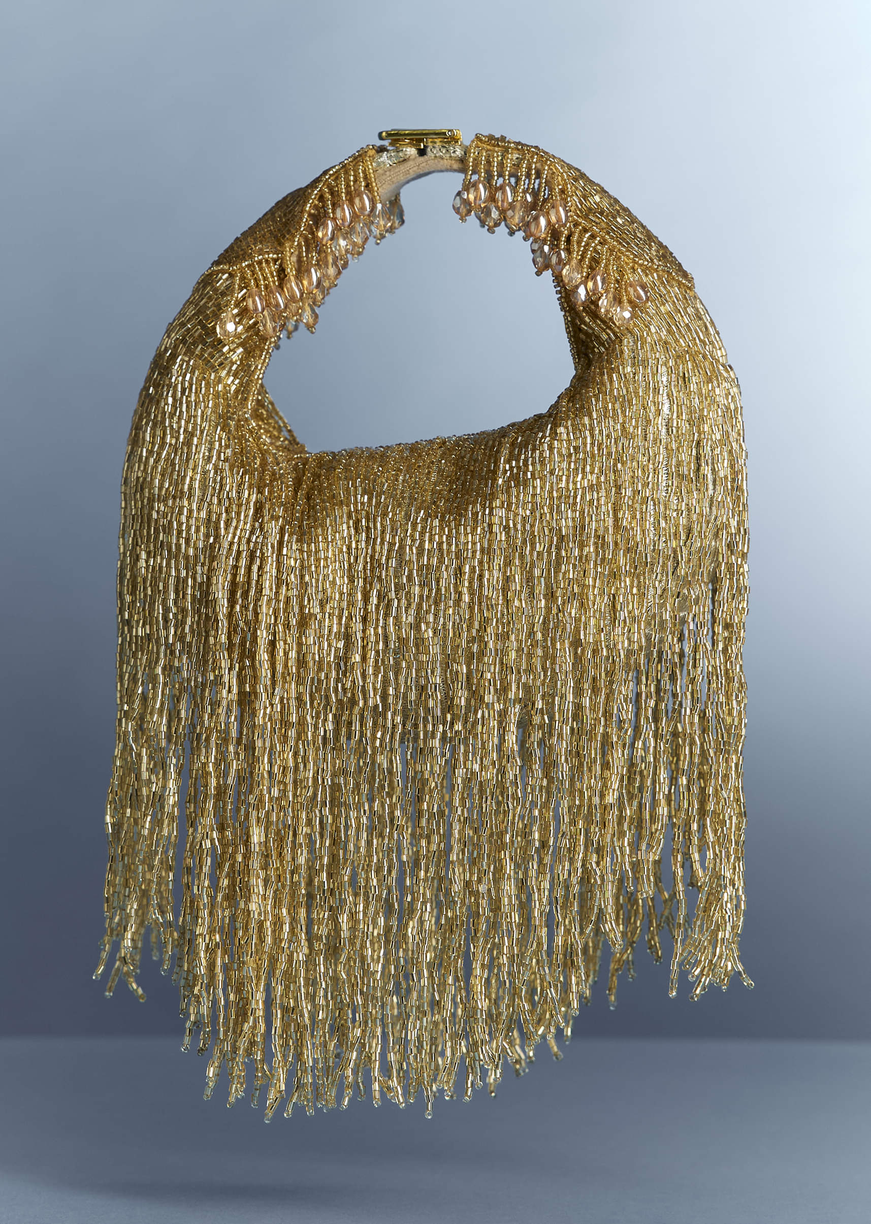 gold_potli_with_tassel-sg329670-1-nosto_3.jpg