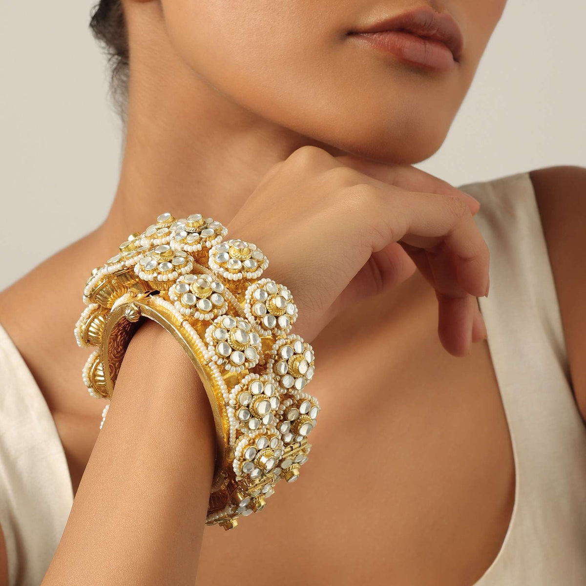 gold_tone_kundan_bangle_with_pear-sg166388_6_60822a6f-4e8e-4704-8a2f-855621f7fc2f.jpg