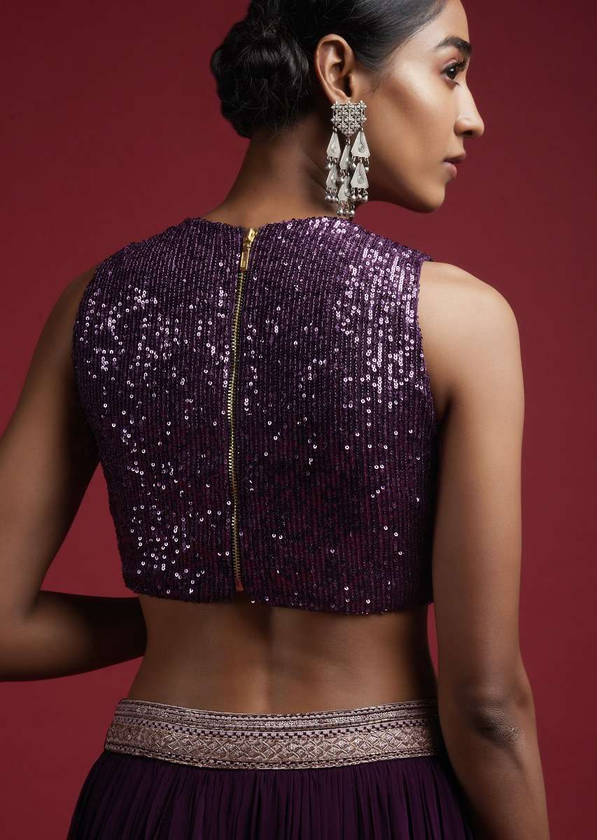 grape-purple-sleeveless-blouse-in-sequins-fabric-with-curved-hemline-and-back-zip-closure-online_-kalki-fashion-m001bldy46y-sg57022_3__1_267c7970-cf61-4a17-9ada-54eaca5c369f.jpg
