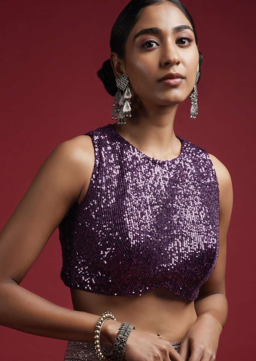 grape-purple-sleeveless-blouse-in-sequins-fabric-with-curved-hemline-and-back-zip-closure-online_-kalki-fashion-m001bldy46y-sg57022_4__1_66ddf8de-3e53-47ea-bb91-916a8ef216b5.jpg