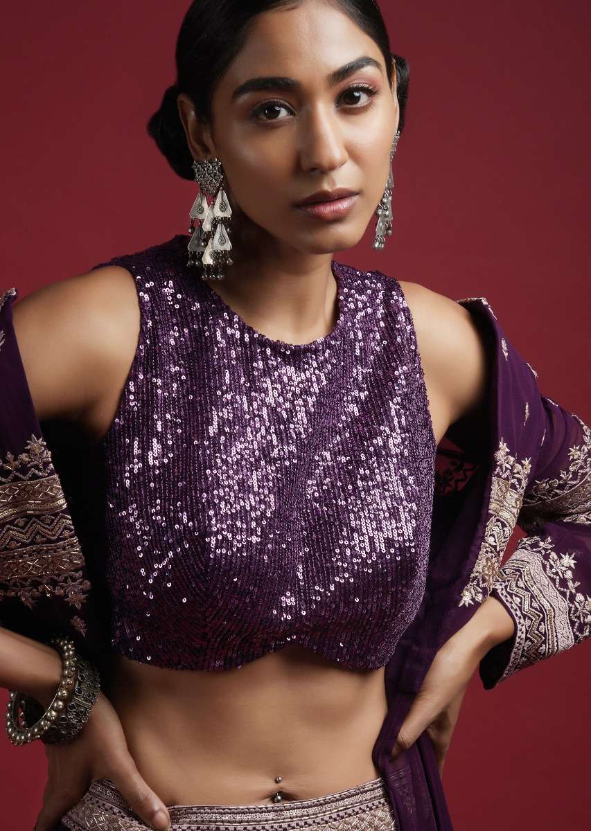 grape-purple-sleeveless-blouse-in-sequins-fabric-with-curved-hemline-and-back-zip-closure-online_-kalki-fashion-m001bldy46y-sg57022_5__1_c14e5a6e-5ab9-4a8e-96ad-580f57f41872.jpg