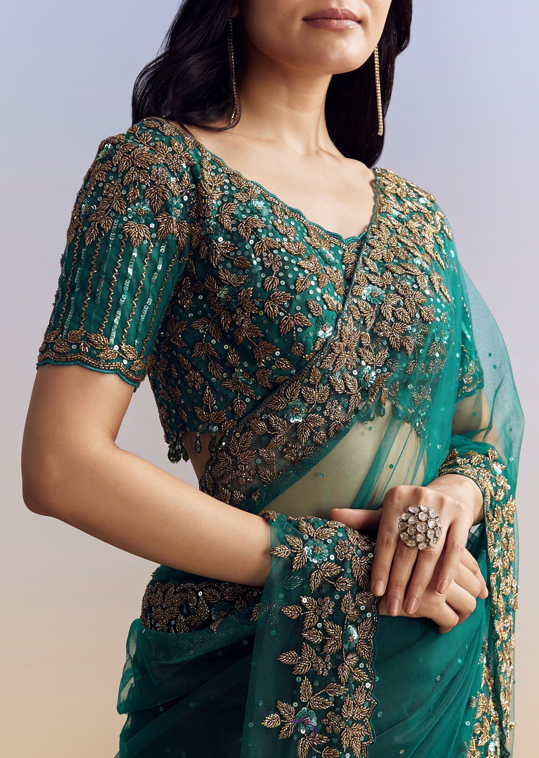 green-net-saree-featuring-heavy-embroidered-border-sg320747-3_6369a7c5-2499-4f61-a2ac-f6b2a56f8bc6.jpg