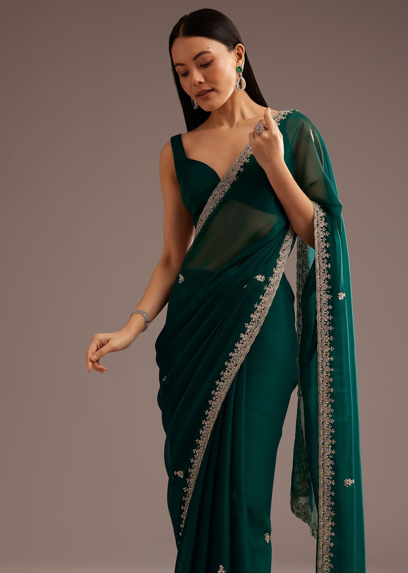 green-organza-saree-with-cutdana-and-sequins-border-sg285290-1_43d47745-ae9d-4281-93a3-d6b9cf6c8d4e.jpg