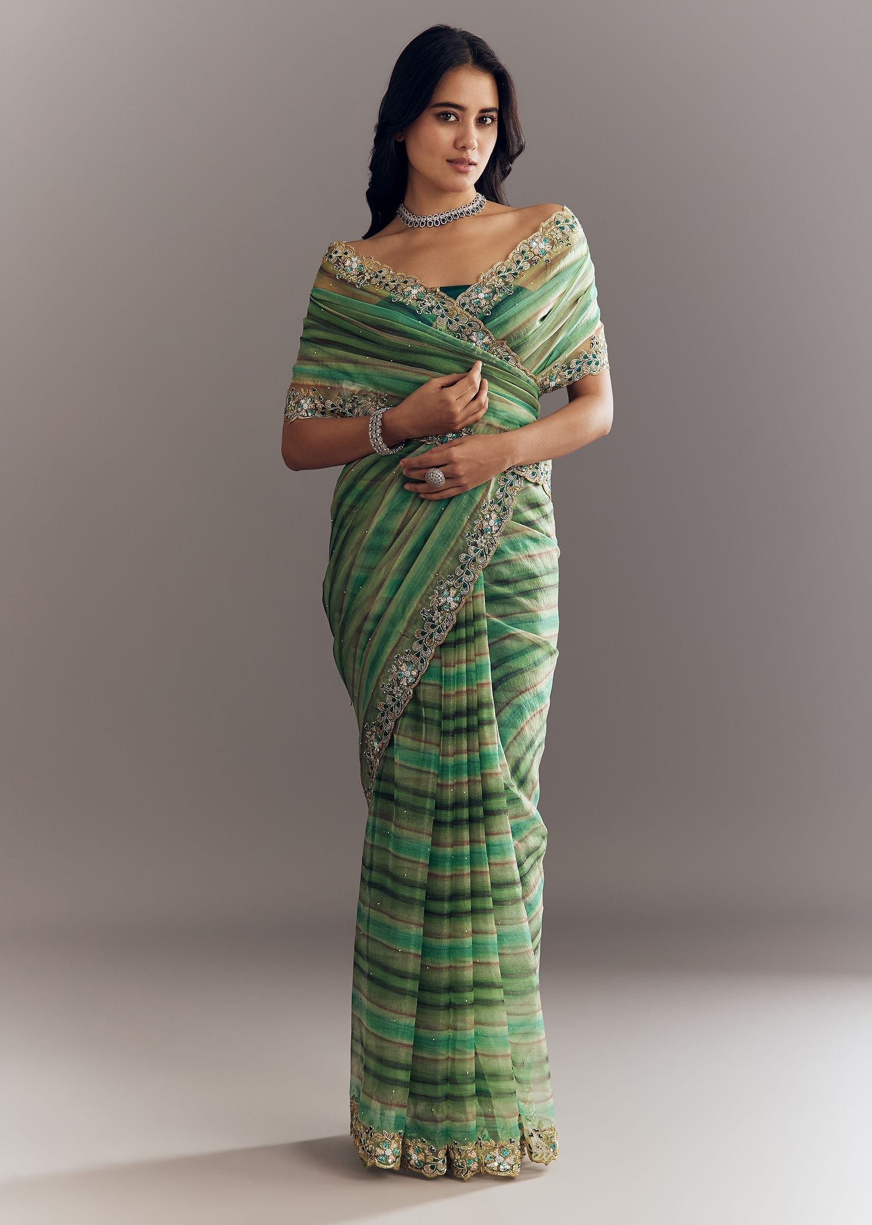 green-shaded-tissue-saree-with-cutdana-sequins-and-beads-embroidery-and-scallop-border-sg292890-3_d94a68aa-3c12-4cef-a5b4-a9d7cc1849ff.jpg