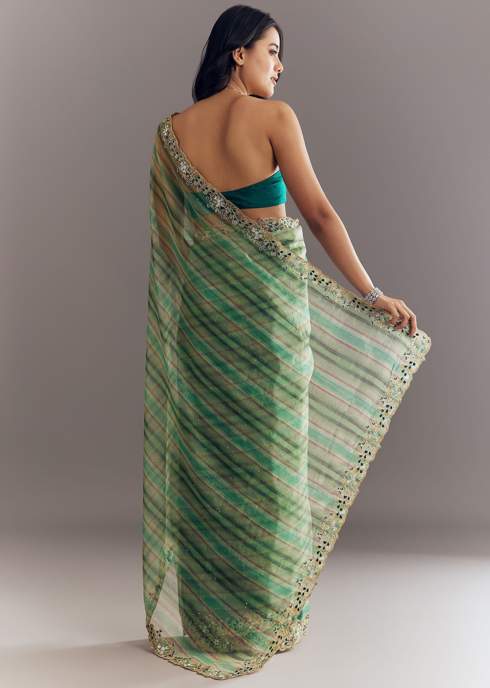 green-shaded-tissue-saree-with-cutdana-sequins-and-beads-embroidery-and-scallop-border-sg292890-4_c8d32f06-eac4-45df-a3c5-1eb6aef6a215.jpg