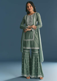 green-silk-kurta-set-with-moti-and-cutdana-sharara-sg318421-1_1c1baa21-6f60-4556-a154-3a5767ce300a.jpg