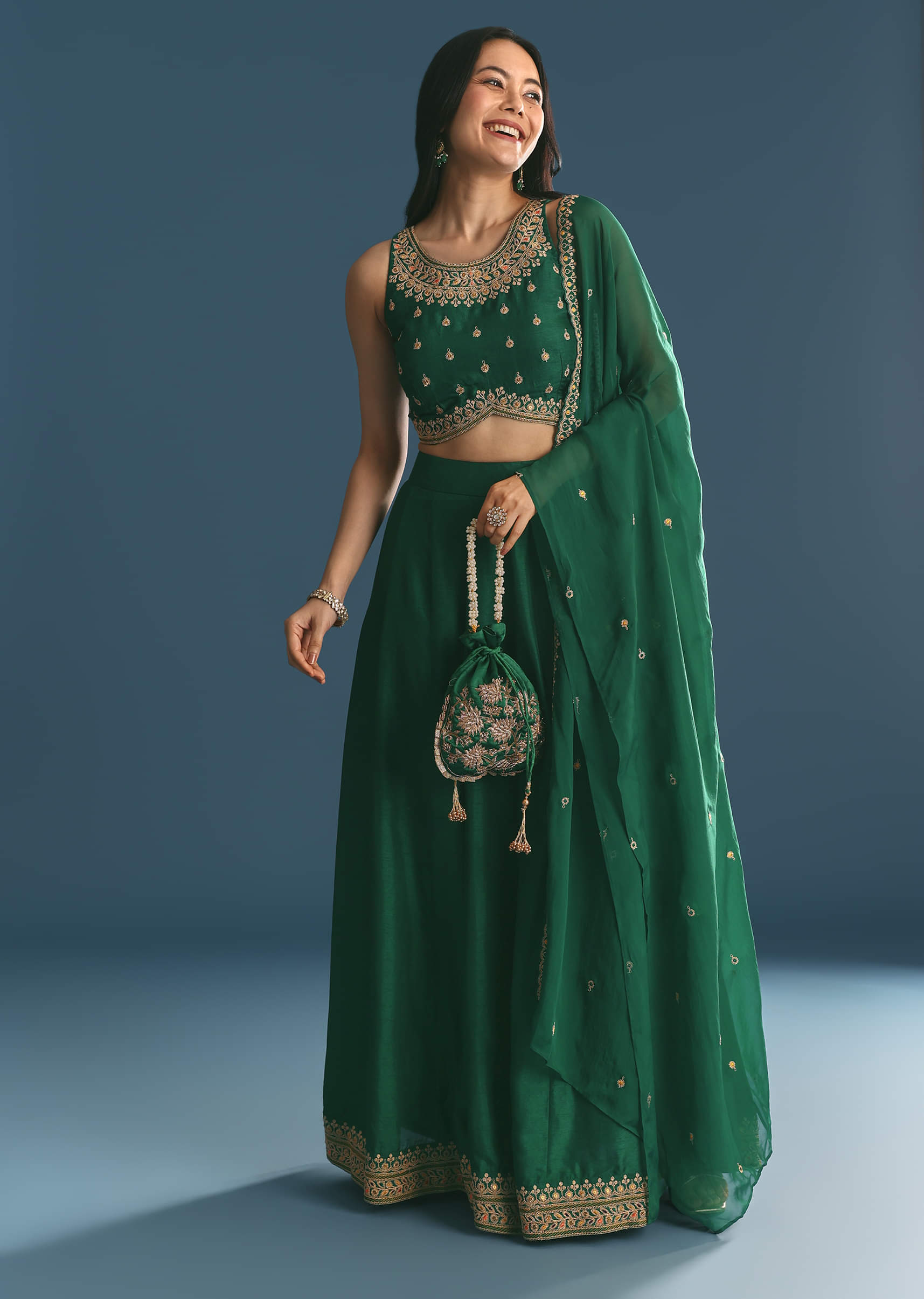 green-silk-lehenga-choli-with-zari-and-sequins-work-sg327813-1_fb9a8c20-2f70-4cce-9a24-e81b45b8813b.jpg