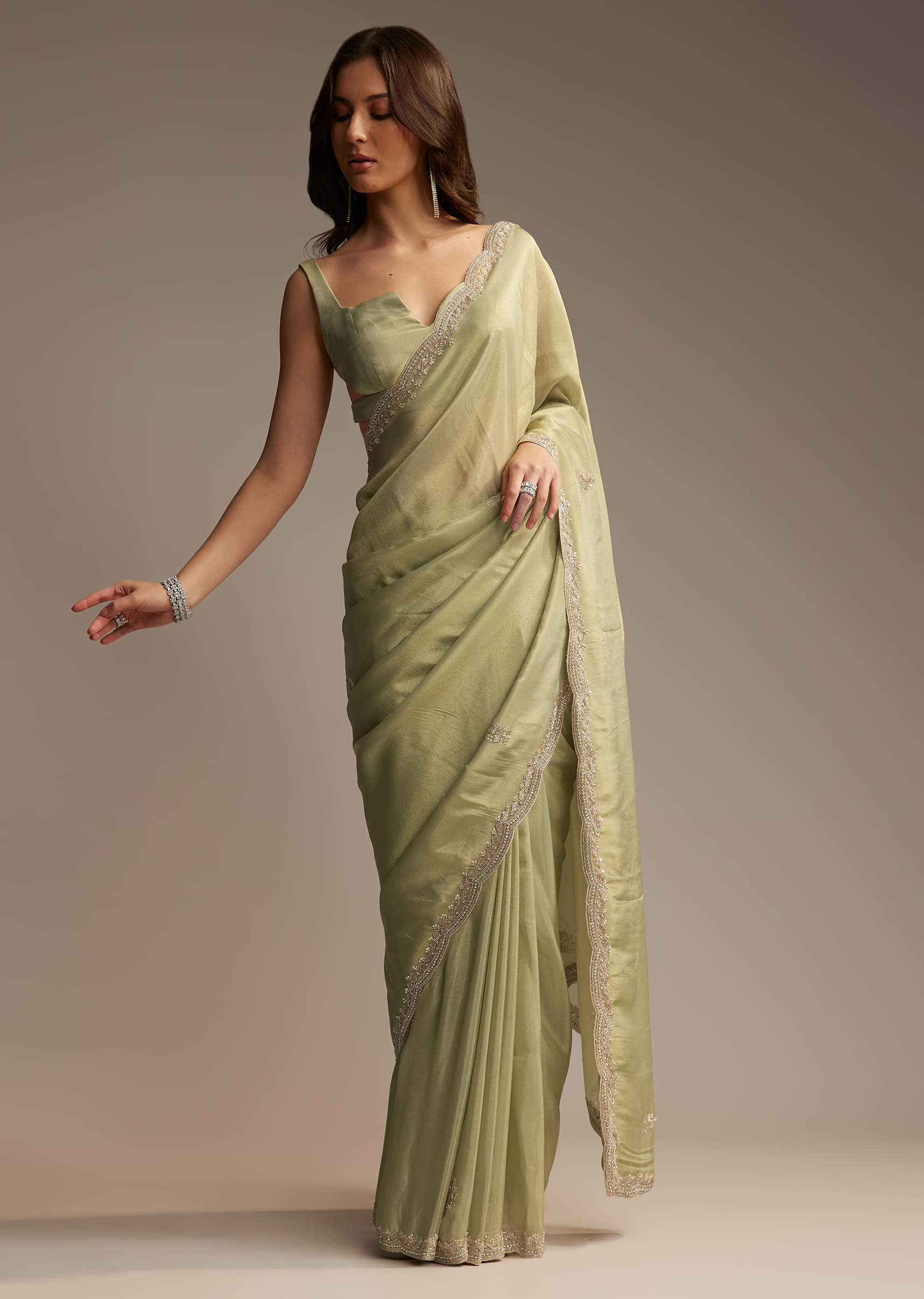 green-tissue-saree-with-cutdana-and-sequin-embroidery-sg325661-1_c2eb8cb7-2ed3-44f4-b3c6-dad6b0624d93.jpg