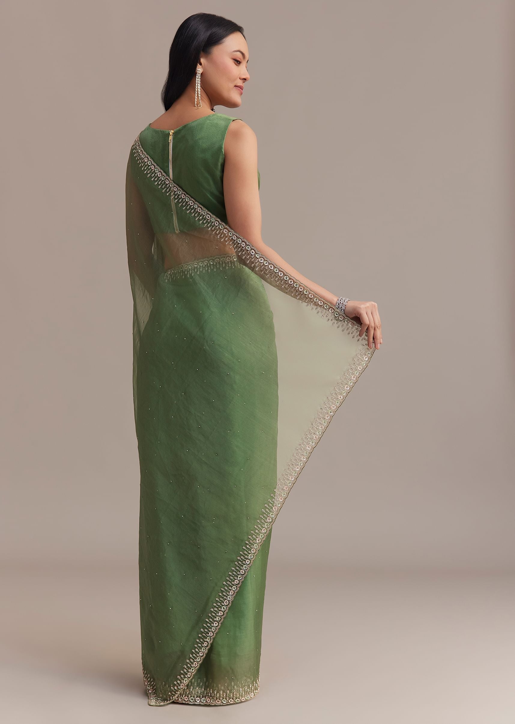 green_organza_saree_with_sequins_and_cutdana_embellished_border-sg276502_4_532eec4e-36ff-48d2-80d1-e74e5336ee2c.jpg