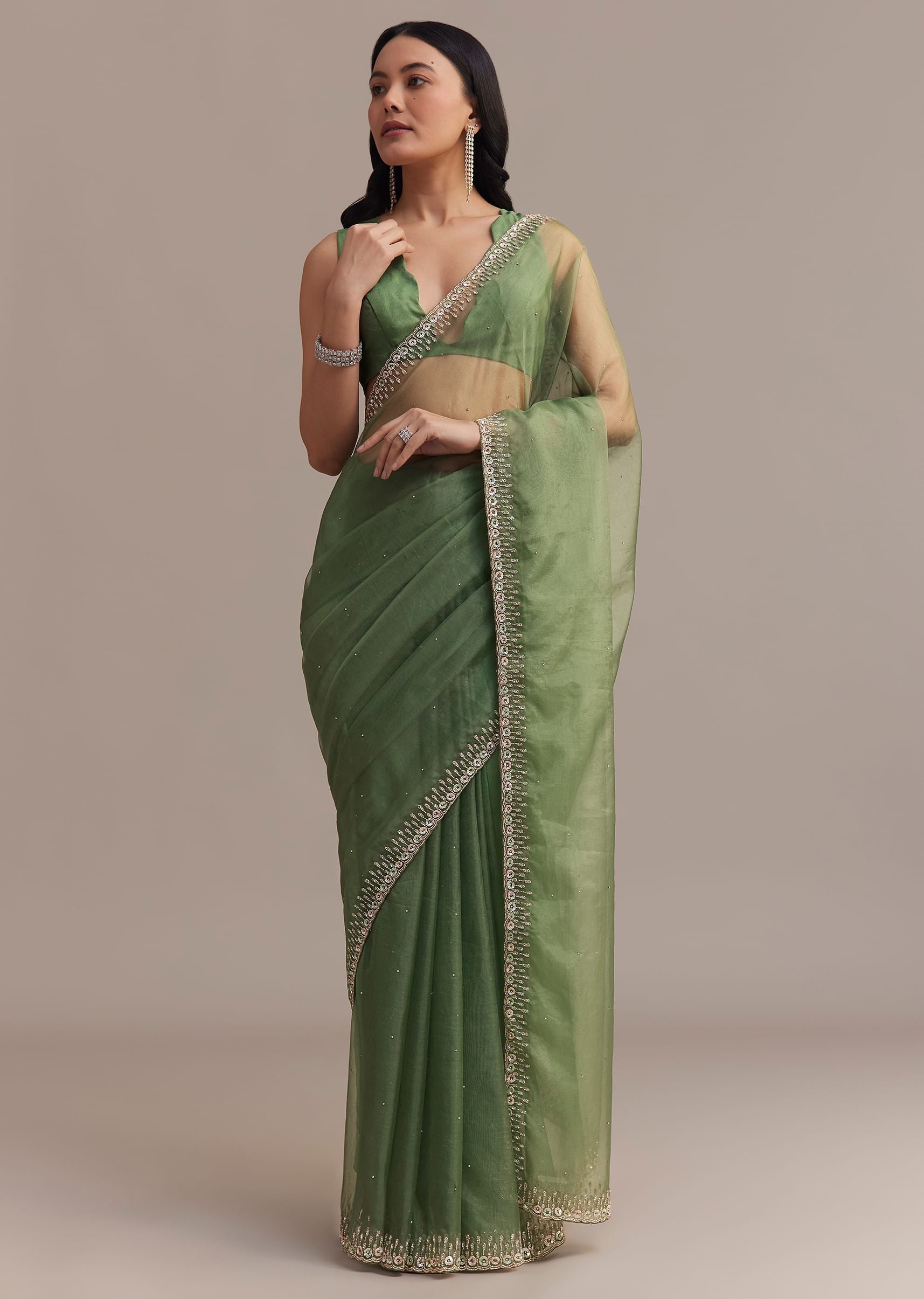 green_organza_saree_with_sequins_and_cutdana_embellished_border-sg276502_9_32dac3e6-1196-4d49-ab93-e8bda824aa60.jpg