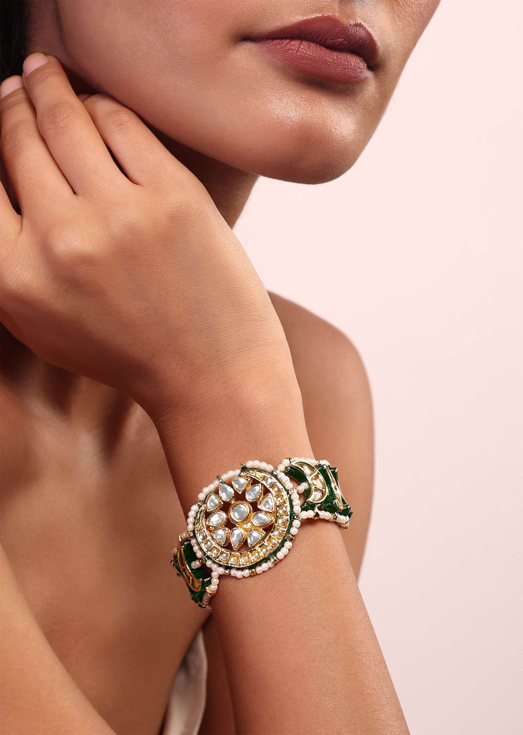 green_toned_kundan_and_pearl_bracelet-sg139504_2_7fbd574d-aa9b-4f0e-b2dd-1a33e8e37a2f.jpg