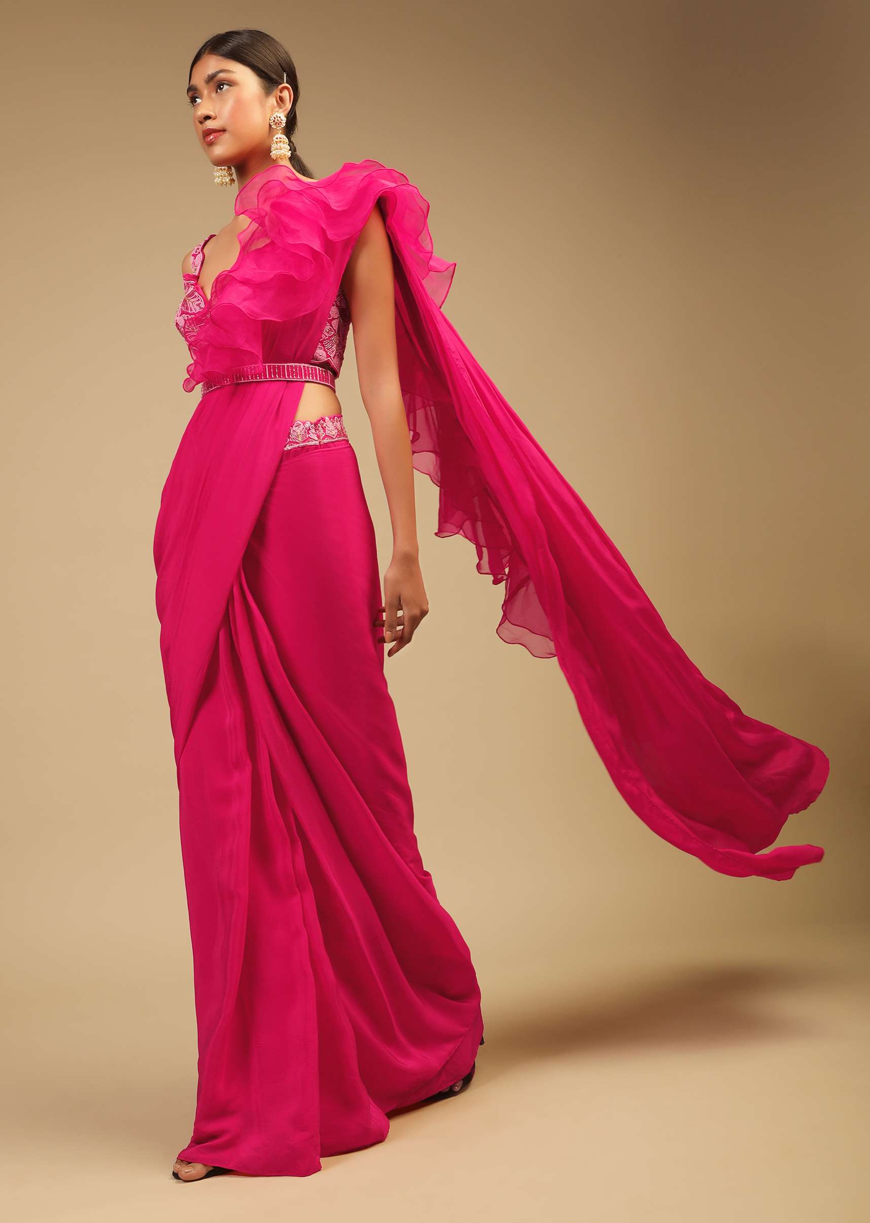 hot-pink-ready-pleated-saree-in-crepe-with-ruffle-frill-on-the-pallu-and-beads-embroidered-crop-top-and-belt-online-kalki-fashion-m001at401y-sg73859_6_be800bc2-c7eb-4876-b9f6-63d751df_0106b551-2e61-46d3-981d-e5a9307faddc.jpg