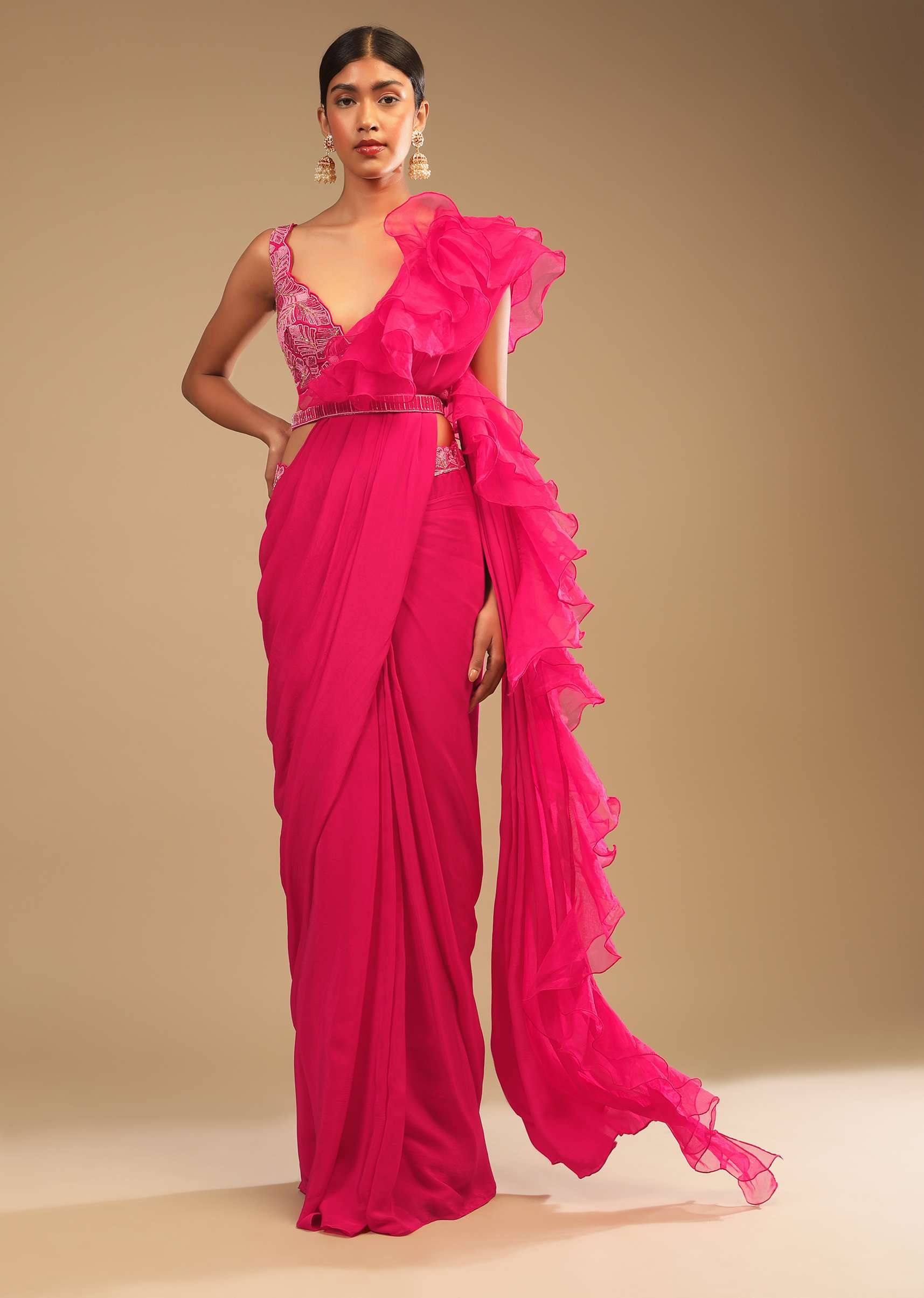 hot_pink_ready_pleated_saree_in_crepe_with_ruffle_frill_on_the_pallu_and_beads_embroidered_crop_top_and_belt_online_-_kalki_fashion_-4_2_7c027281-7c0e-4435-9fd7-2ea5276df6de.jpg