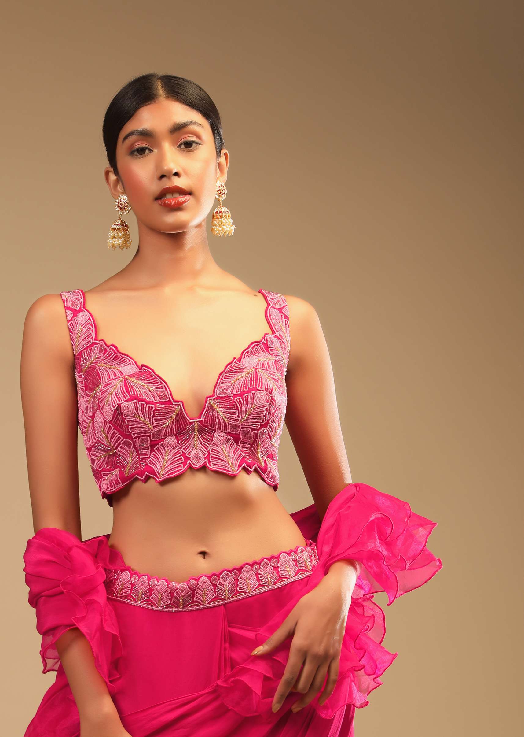 hot_pink_ready_pleated_saree_in_crepe_with_ruffle_frill_on_the_pallu_and_beads_embroidered_crop_top_and_belt_online_-_kalki_fashion_-4_3_51a09c95-bf01-414b-869a-12845afc8329.jpg