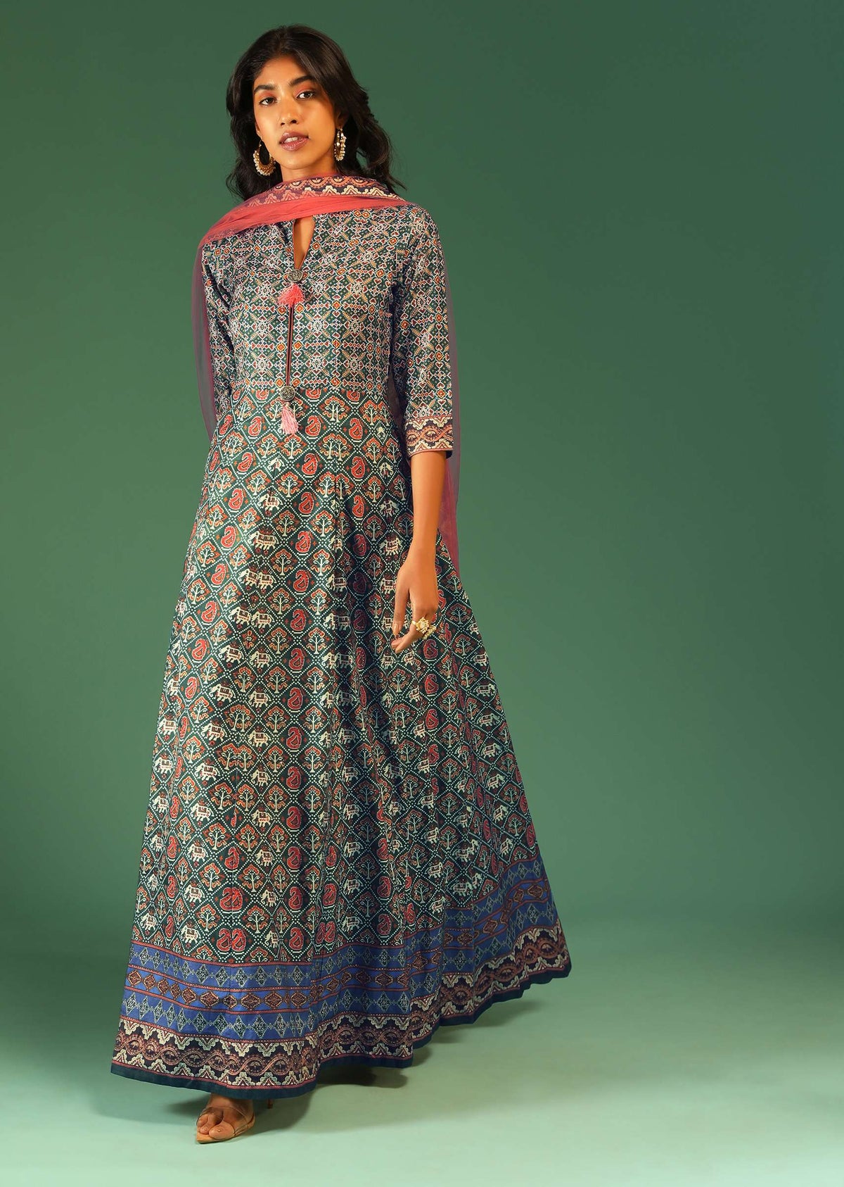 hunter-green-anarkali-suit-in-raw-silk-with-patola-print-and-kundan-detailing-along-with-a-pink-net-dupatta-online-kalki-fashion-m138gt2115y-sg72734_1_f1f494a3-def7-47b7-b5fb-e94797b4_7e45d344-e306-457b-b604-c9bba357c934.jpg