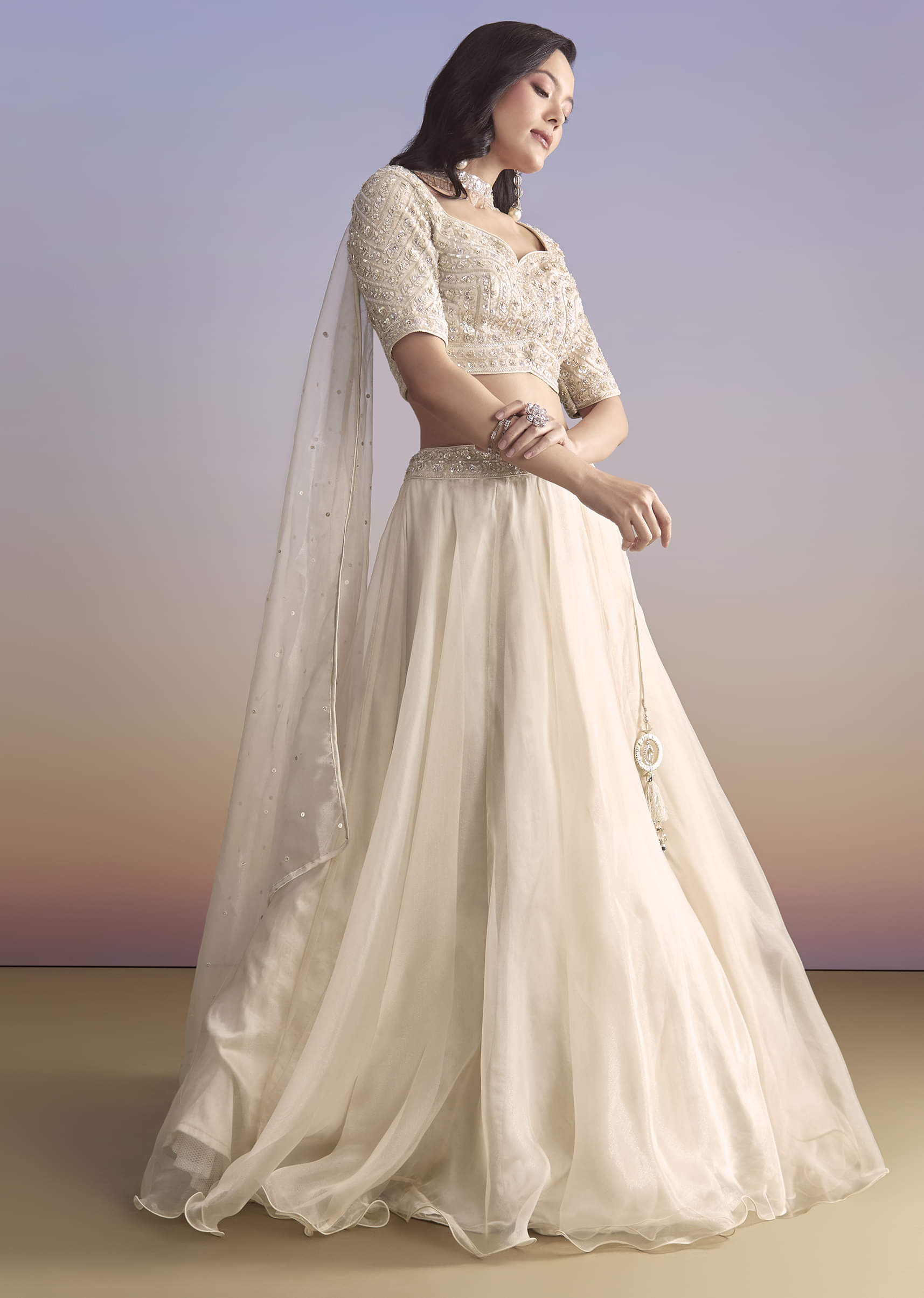 ivory-organza-bridesmaid-lehenga-with-sequins-and-cutdana-embroidery-sg320908-4.jpg