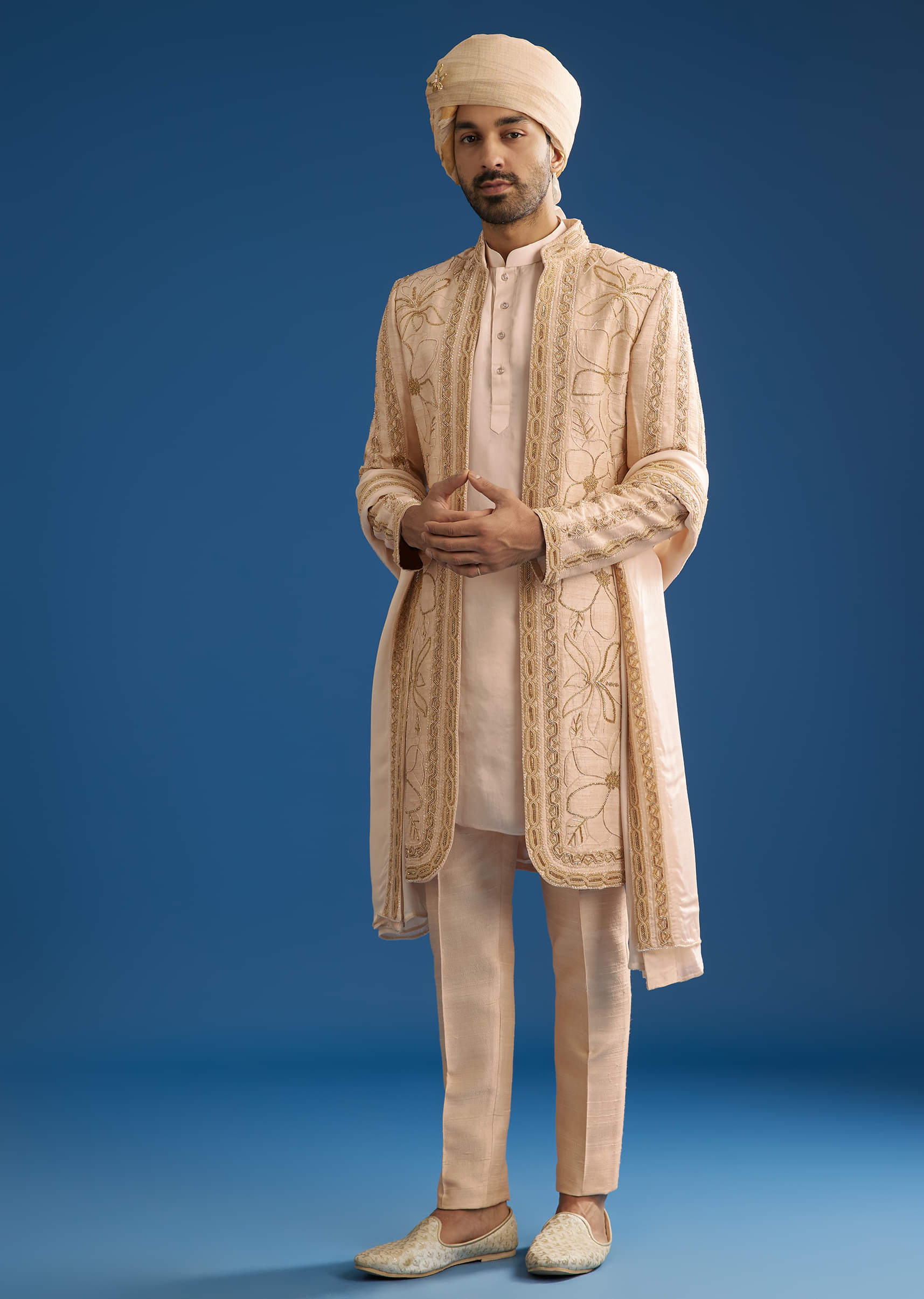 ivory-raw-silk-sherwani-set-with-mixed-hand-work-and-organza-satin-accents-sg288108-1_31dc9b33-25b2-407a-a331-6a279dea9ca3.jpg