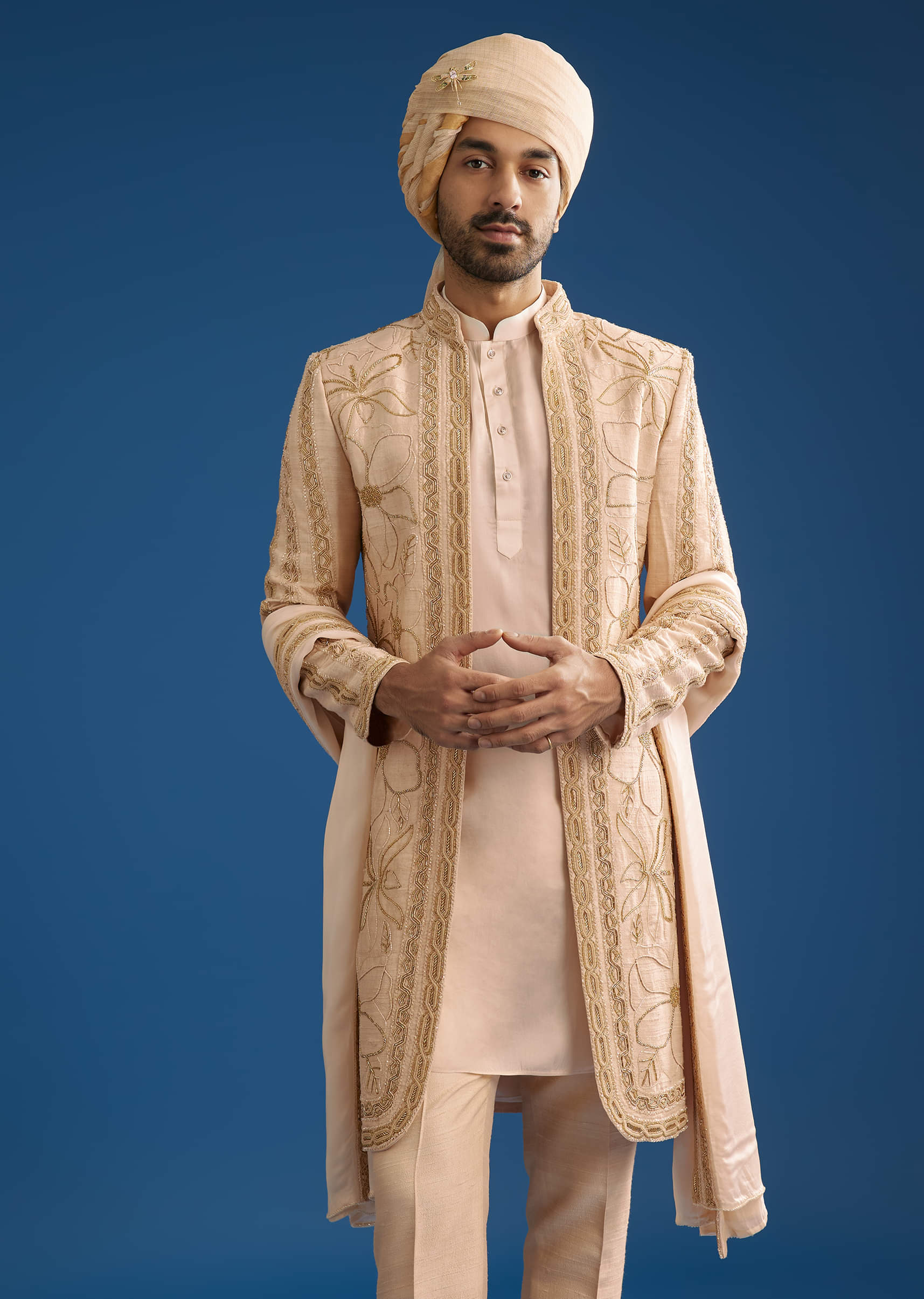 ivory-raw-silk-sherwani-set-with-mixed-hand-work-and-organza-satin-accents-sg288108-2_2f91205f-dbab-4f96-89c0-885d7c0339e6.jpg