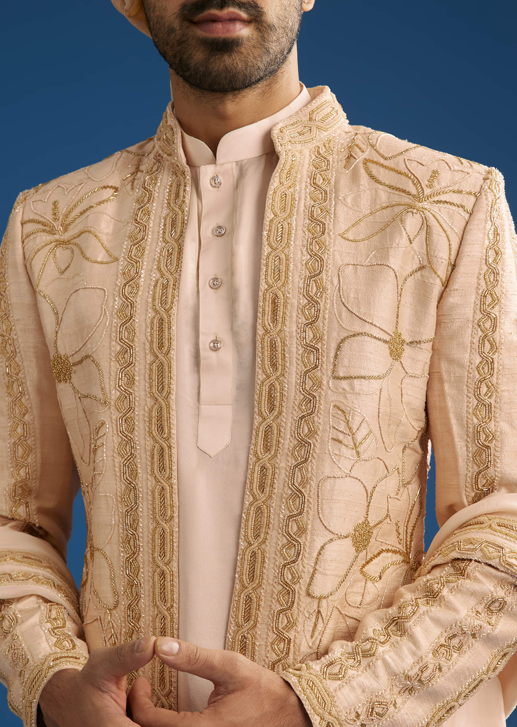 ivory-raw-silk-sherwani-set-with-mixed-hand-work-and-organza-satin-accents-sg288108-5_be5ac9f1-779e-4d68-92bf-d3c17c3af567.jpg