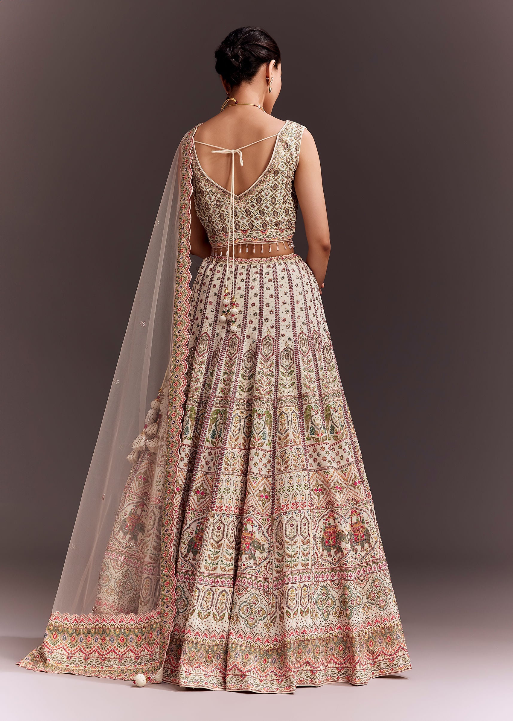 ivory_embroidered_lehenga_set_with_ethnic_motifs-sg281323_2__nasto_501e463e-9260-453f-9aff-f0b8b26c6e1e.jpg
